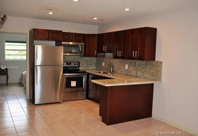 4140 Woodside Dr #202, Coral Springs, FL 33065