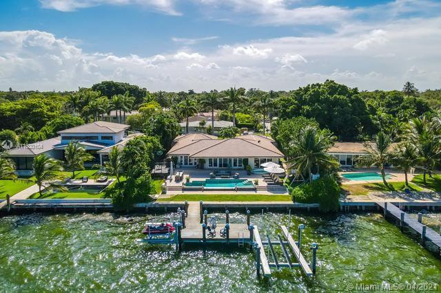 STUNNING WATER FRONT PROPERTY IN PRESTIGIOUS NEIGHBORHOOD OF MIAMI SHORES, SEATING RIGHT ON THE BAY FACING EAST OF MIAMI BEACH. ENJOY THIS AMAZING 5 BEDROOMS, 4.5 BATHS,TOTALLY RENOVATED, BIG LOT, HEATED INFINITY POOL, NATURAL GAS GENERATOR. NEW BOAT LIFT THAT CAN HOLD ANY BOAT, DOCK HAS ELECTRIC & WATER, INFINITY POOL HAS AUTO REFILL. OPEN FLOOR PLAN WITH AMAZING BAY VIEWS. HUGE EAT-IN KITCHEN, WALK-IN PANTRY & BIG LAUNDRY ROOM WITH EXTRA FRIDGE & DISHWASHER. MASTER BEDROOM OVERLOOKS THE BAY; BIG WALK-IN CLOSET & SPA LIKE BATH WITH DUAL SINKS, SOAKING TUB & LARGE SHOWER. ATTACHED 2 CAR GARAGE WITH A/C. SECURITY SYSTEM, IMPACT WINDOWS, SOUND SYSTEM INSIDE AND OUT, FLOOR TO CEILING IMPACT GLASS, AND STUNNING WATER VIEWS.
