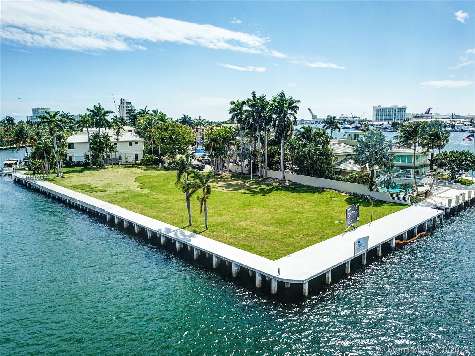 Spectacular Point lot where the intracoastal meets the New River offering panoramic open vistas. Boasting 390+ of water frontage, accommodating large and multi yacht dockage truly just minutes from the ocean. New Seawall and new Dock. Unobstructed views extend far and wide toward the long westward expanse up the New River to downtown Ft Lauderdale. Residents of gated Harbor Beach also have access to the private oceanfront beach club. This oversized lot (29,823 sq ft) located on a very quiet street is ready for a new home. Surrounding homes are in the 19M-25M range so you can easily build a dream home starting with this magnificent piece of property.