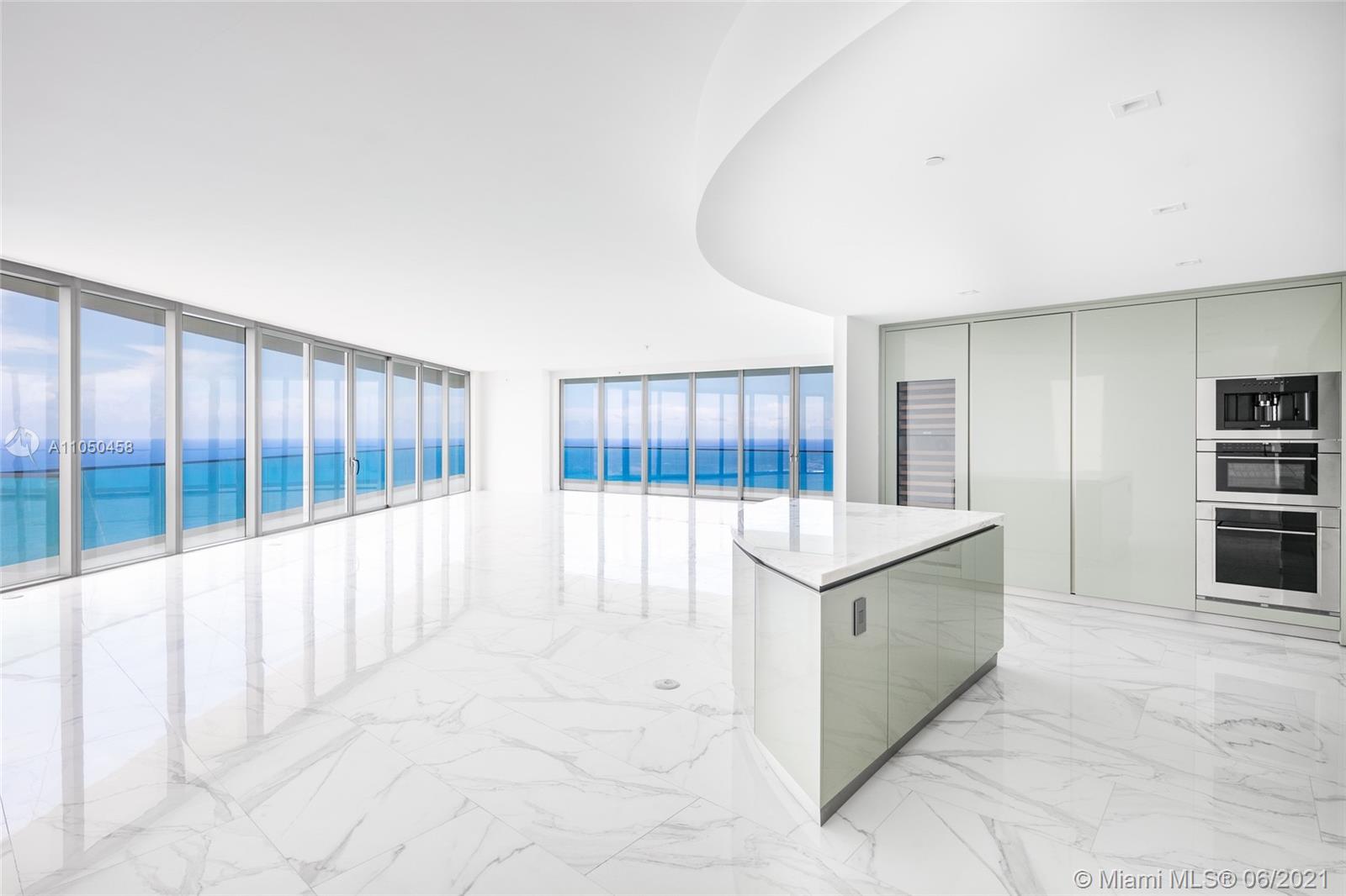 Highest Floor Available in the Best Line "00" at Residences at Armani Casa. Residence #5100, finished with oversized Italian tile, is the largest corner layout (4bed/5.5 bath + Service) and the only line with a private foyer. Enjoy breathtaking direct ocean and sweeping intracoastal views from all areas. The interior living space is spacious, modern & elegant with 10 Ft ceilings. Expansive 10 foot-deep balconies with summer kitchen create a seamless expansion of living space into the fresh air. Sleek European kitchen. Smart residence w/digital thermostat. Impeccable main suite with midnight bar, his & hers baths with breathtaking ocean view. Armani Casa residents can indulge in beach service, full service spa, private restaurant, game room, cigar/wine room, & child's play room.