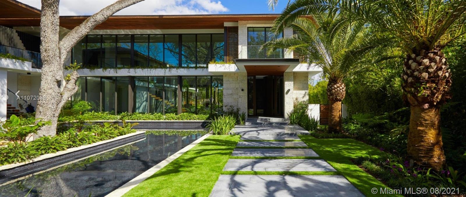 Welcome to your own piece of paradise in gated/walled in community of Bay Point. This parcel of land is being sold with plans to build an amazing new tropical modern estate on the extremely quiet street of Hibiscus Drive. With over 13,900 Sq.Ft., you have a large & empty slate to build.Fully mature Oak Trees & Mango Trees line the property instantly giving old-world charm & character to your future home. The community of Bay Point is one of the few privately owned communities in Miami.Wonderful family-oriented neighborhood with seasonal events. Gated access & 24/7 security are among the many amenities that secure this exclusive community. Located minutes away from the Design District,Wynwood,Brickell, & Miami Beach, will be centrally located to everything. Price includes lot & plans only.