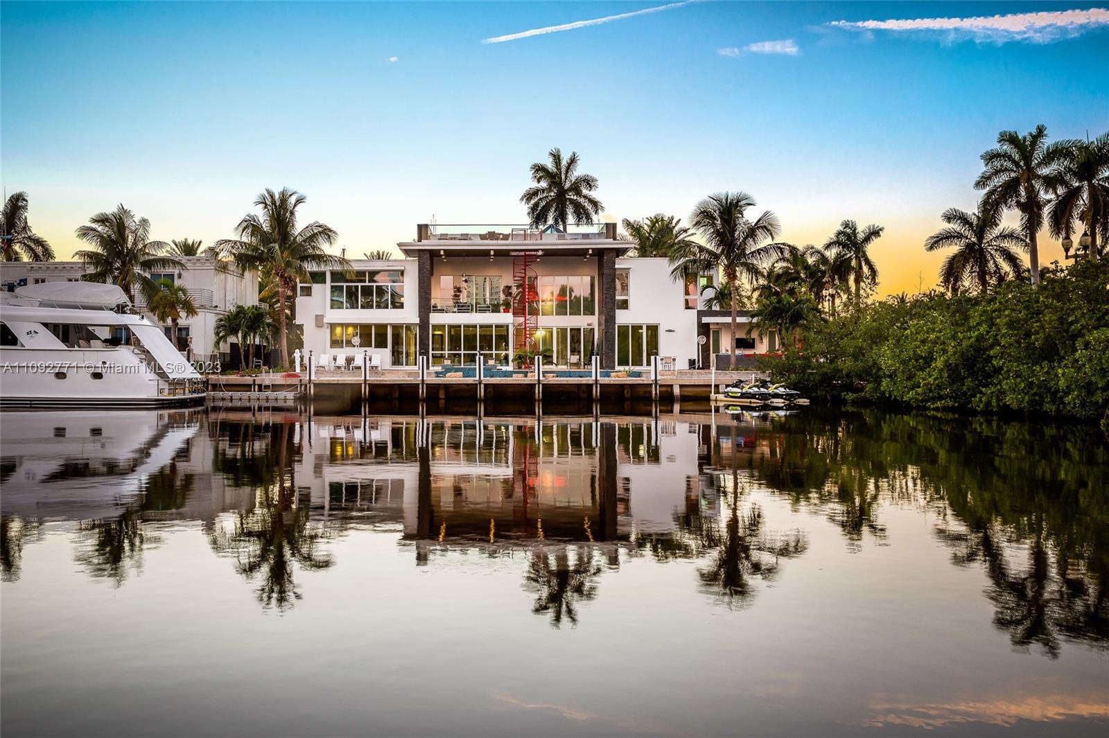 This luxurious and stunning property has 7 beds & 7.5 baths in Las Olas. This gorgeous home was designed with modern luxury in mind and has Italian furniture throughout the interior. Top-of-line chef’s kitchen, gas fireplaces, an elevator, a pristine theatre room, and beautiful ceramic white flooring. This estate comes with access to the intercoastal with a large dock that can accommodate any size vessel up to 90’. This home is within walking distance of restaurants and the beach. This home is the most luxurious property offering all the modern features of impact windows, motorized blinds, multiple ac units, two stoves, and a dishwasher. Outside, enjoy breathtaking views along the outdoor oasis with a beautiful rooftop deck with artificial grass. 60k/month for a year. Can do shorter term.