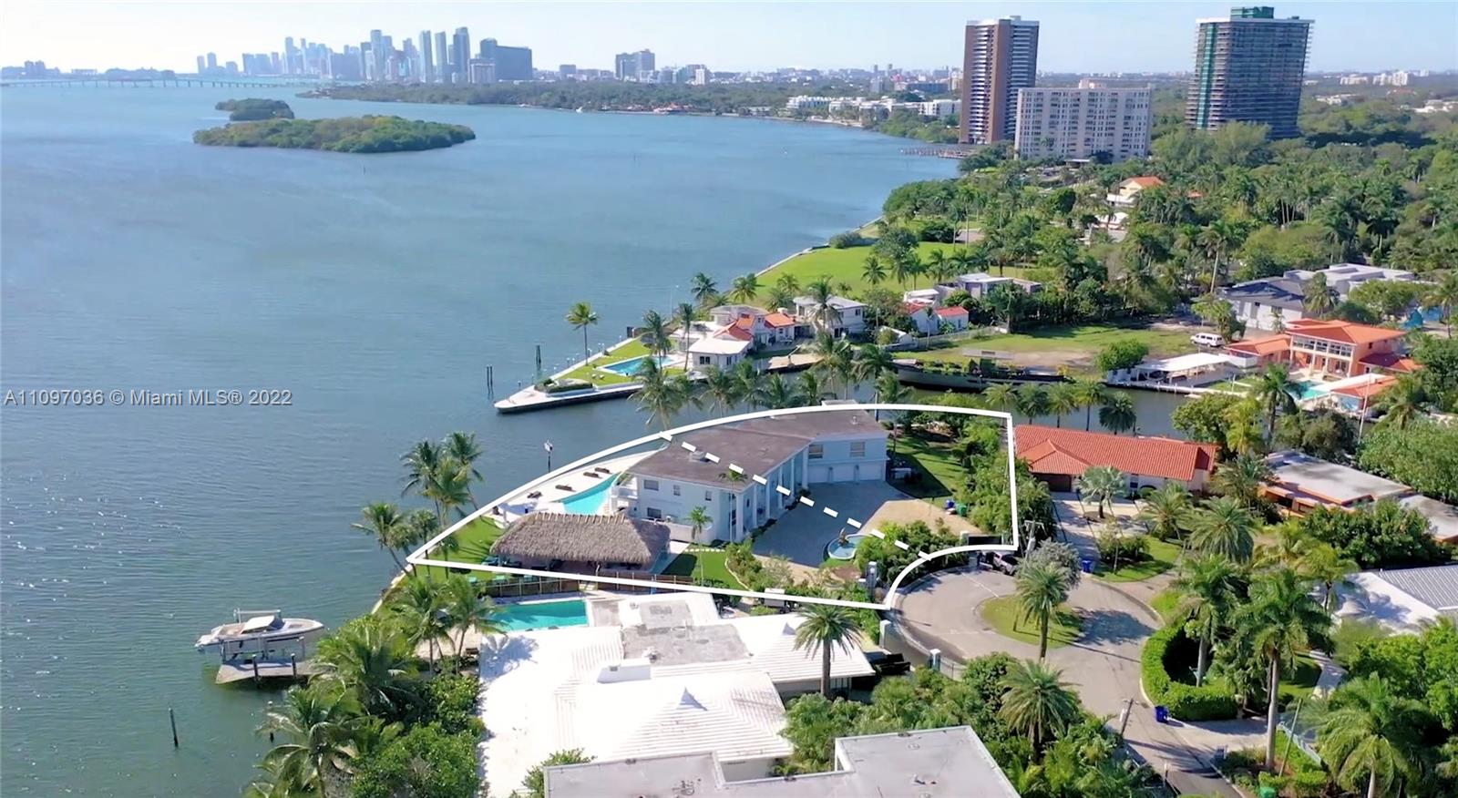 480 FEET OF WATERFRONT, One Miami's Largest Open Bay waterfront available on the market, along with 57,000 SQFT of land! This property is sold as a combined property 7301 & 7305 Belle Meade Island making it one of the most unique properties in Miami.  Enjoy some of the best views of the bay with a bird sanctuary across and watch dolphins swim by along with gorgeous night views of downtown Miami Skylines. The property currently features a combined 11 bedrooms two pools and is combined with a large Tiki hut for entertainment that features, BBQ, BAR, Brick oven pizza, movie Theater, and huge space for events and gathering. Enjoy the home or build a new home with the largest water bay views available. Neighborhood is gated and island is very special with already 4 new homes built.