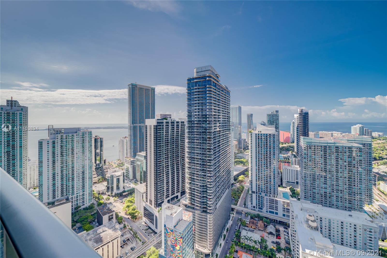 This unique unit on the 47th floor offers you views from the balcony that circle the Miami Skyline & Bay area to view both sunrise and sunset.  Unit features 12 FT ceilings with panoramic views from every room along with an open layout floor plan.