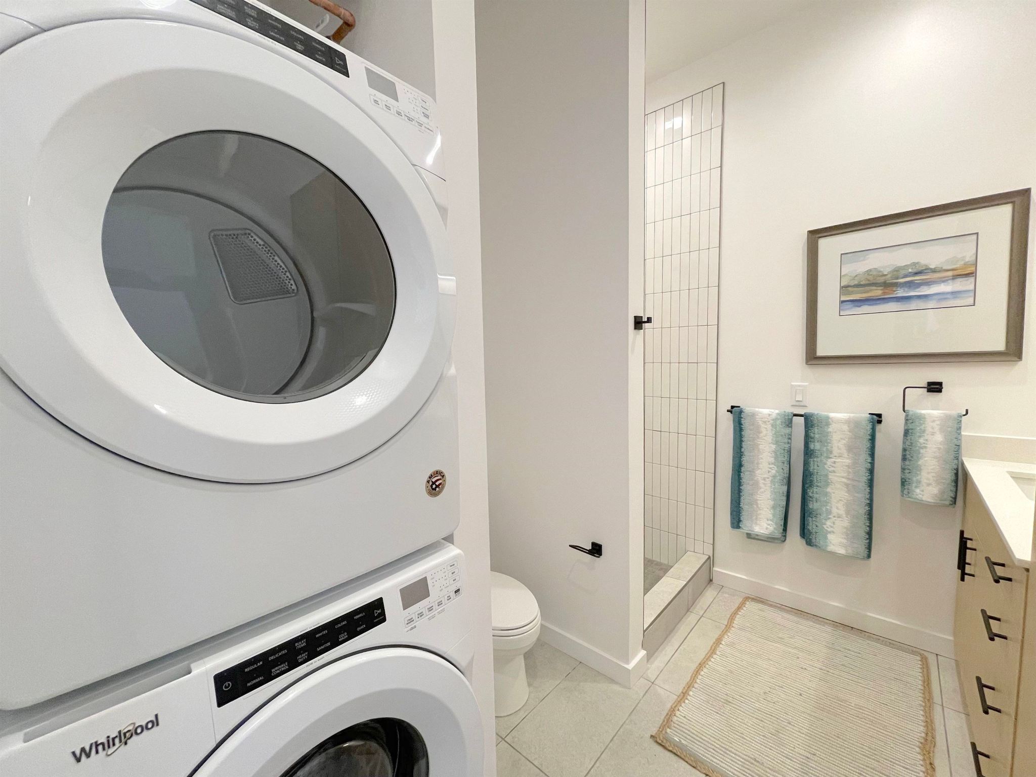 Second Floor – ¾ Bath with stacked Washer and Dryer