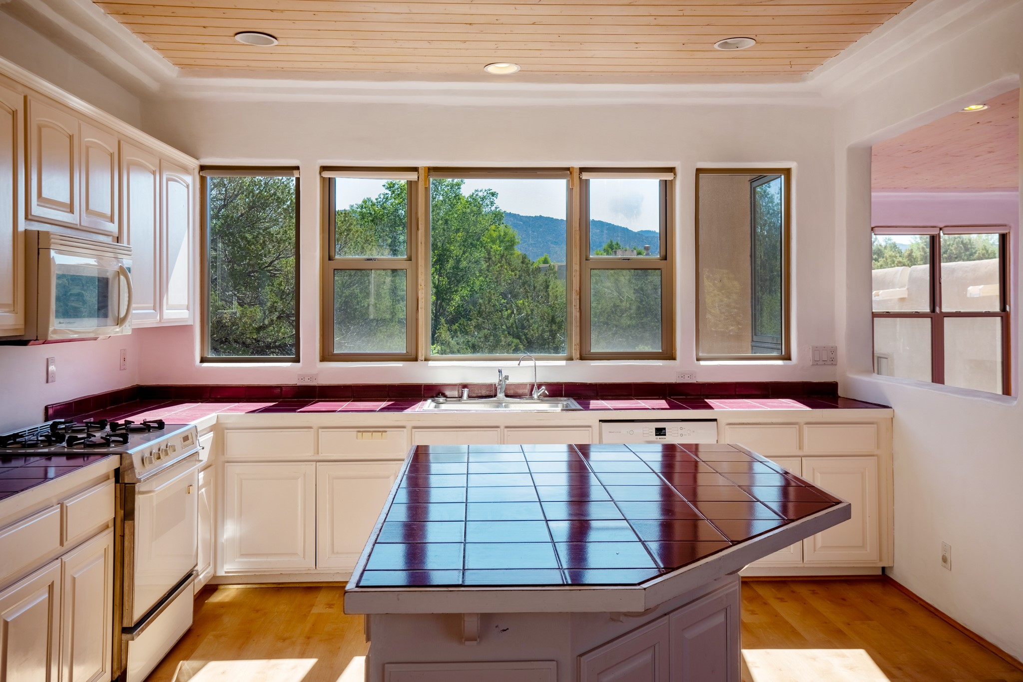 Large kitchen with views of Sun & Moon Mountain.