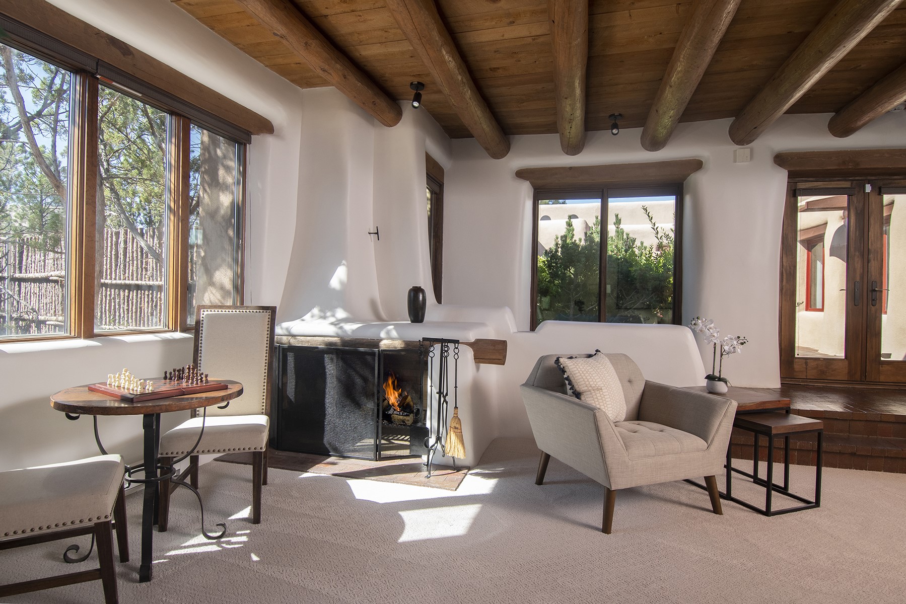 Shepherd's fireplace in 4th bedroom/family room/ guest room. With direct access to center courtyard.