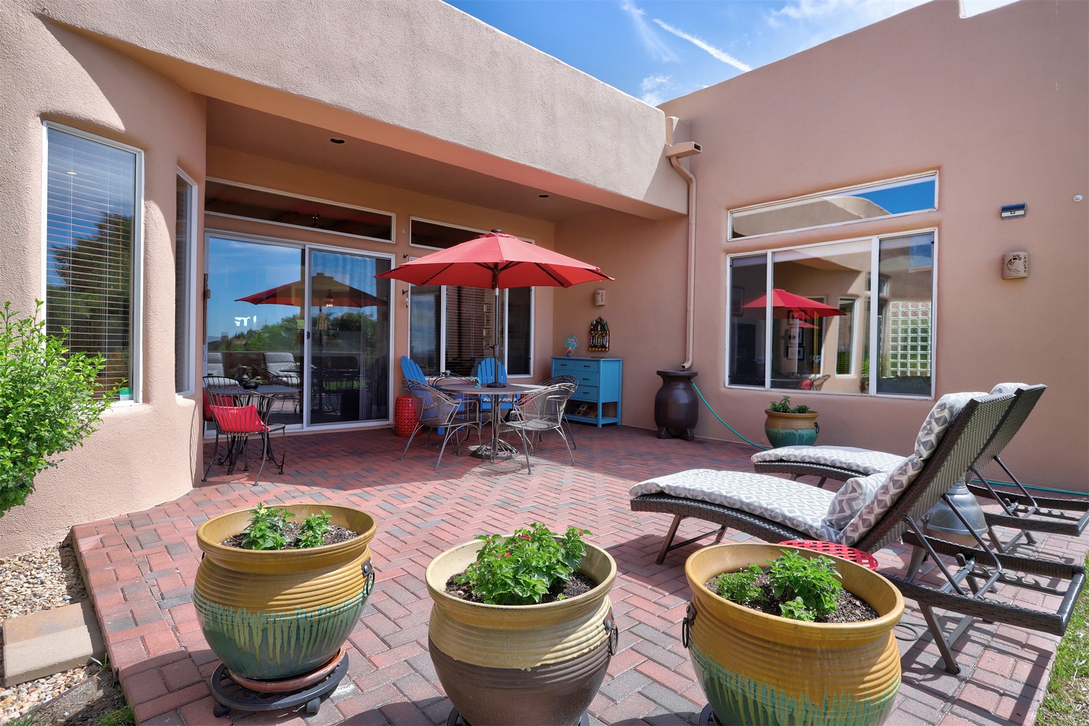 It's Summer!  Enjoy the grand outdoor patio area off the family area.