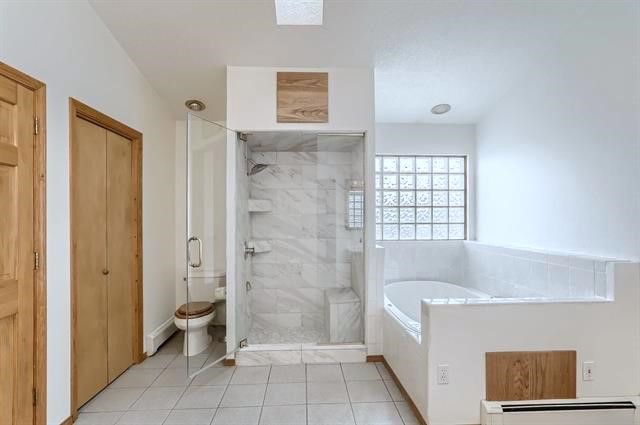Primary Bathroom with jetted tub and separate shower