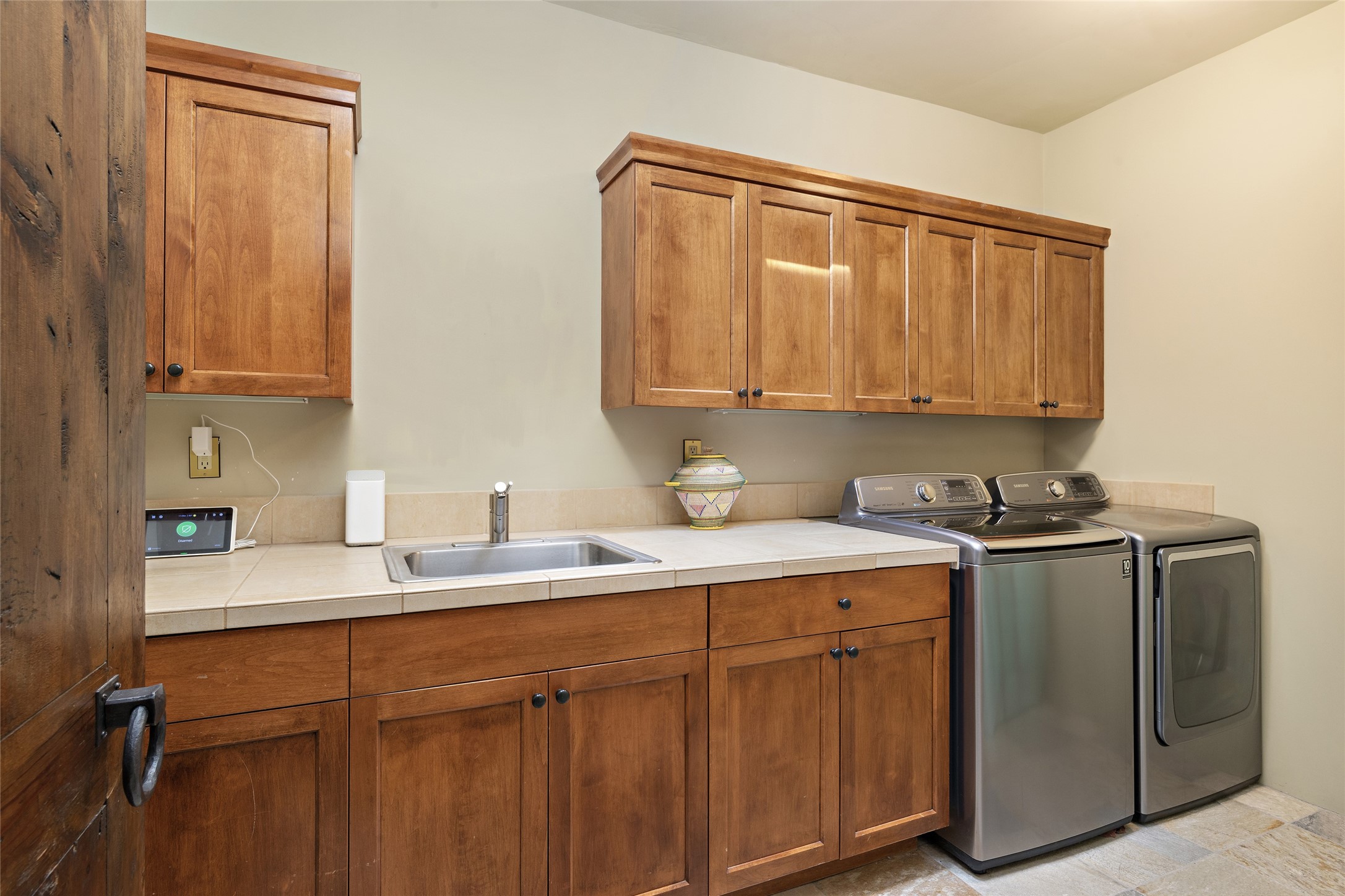Laundry Room with Sink, Washer & Dryer + ample storage