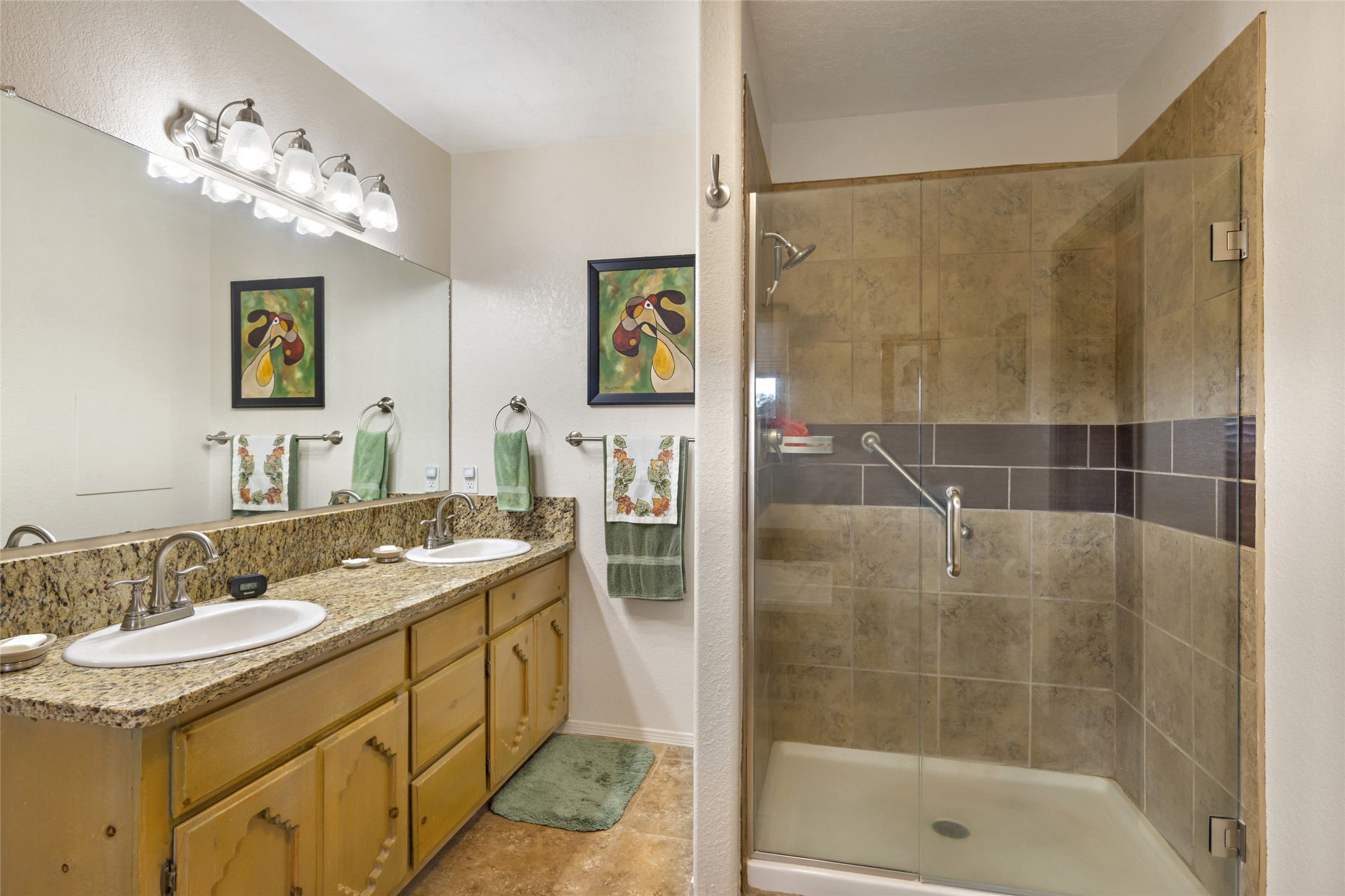 Double sinks and separate shower in primary bath