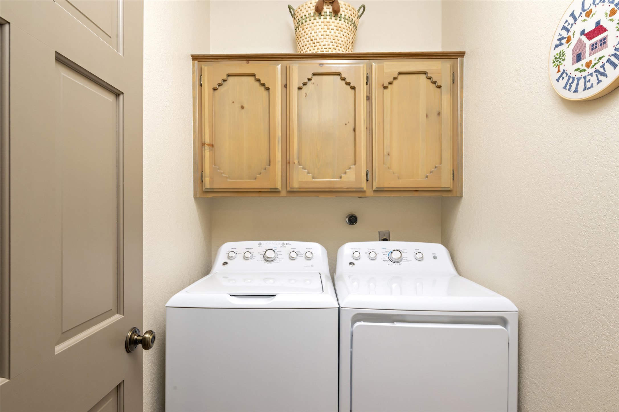 Proper laundry room with storage