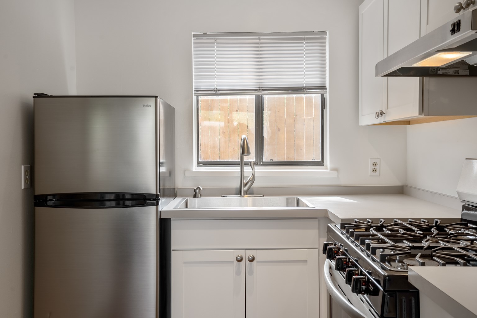 Stainless steel appliances, formica countertops  and new cabinetry