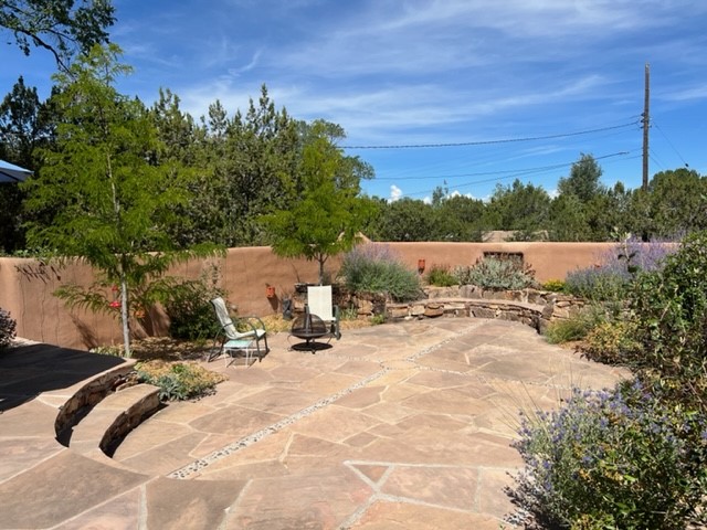 Beautiful paved courtyard off the kitchen looking north