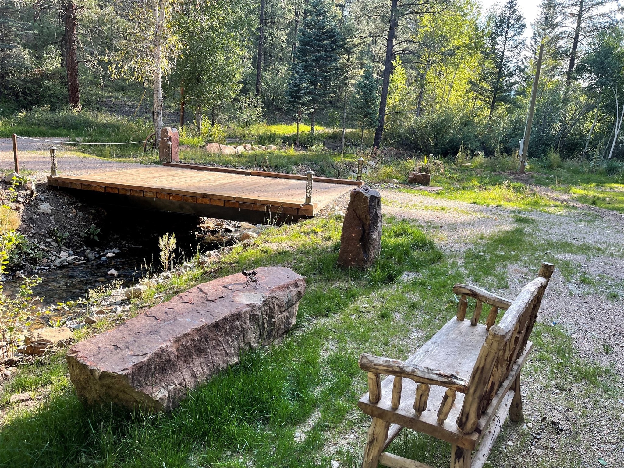 Bench by creek