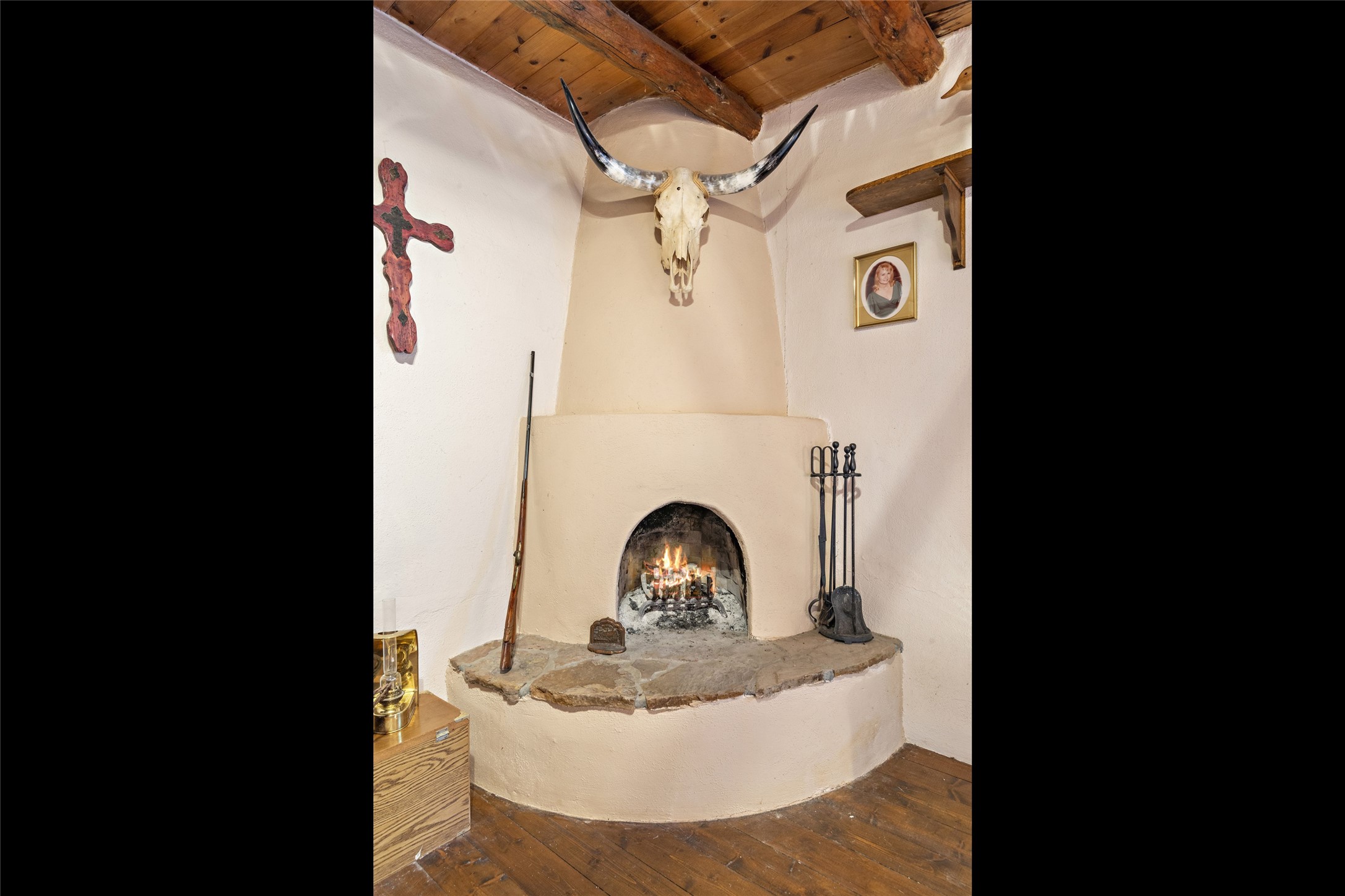Primary Bedroom kiva fireplace