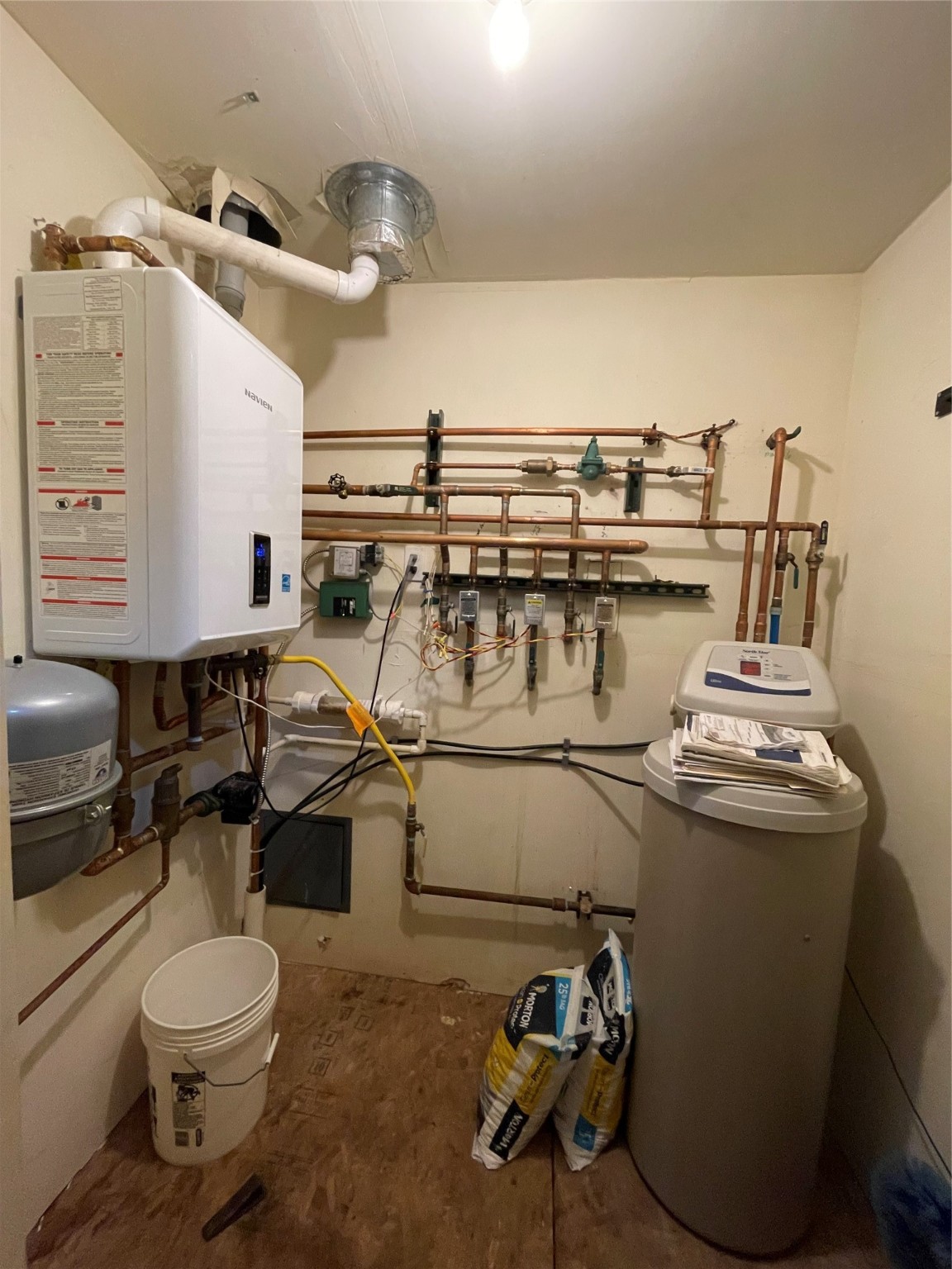 Mechanical room for primary residence accessible from laundry room