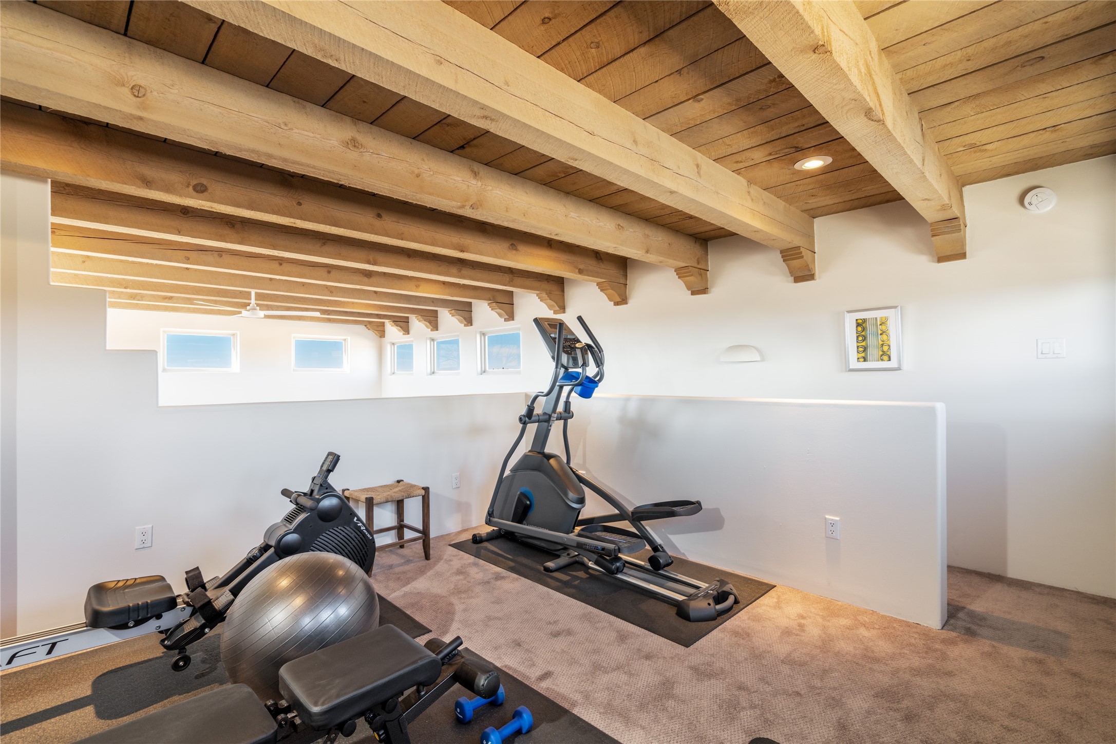 Loft space which is used as a gym-workout space