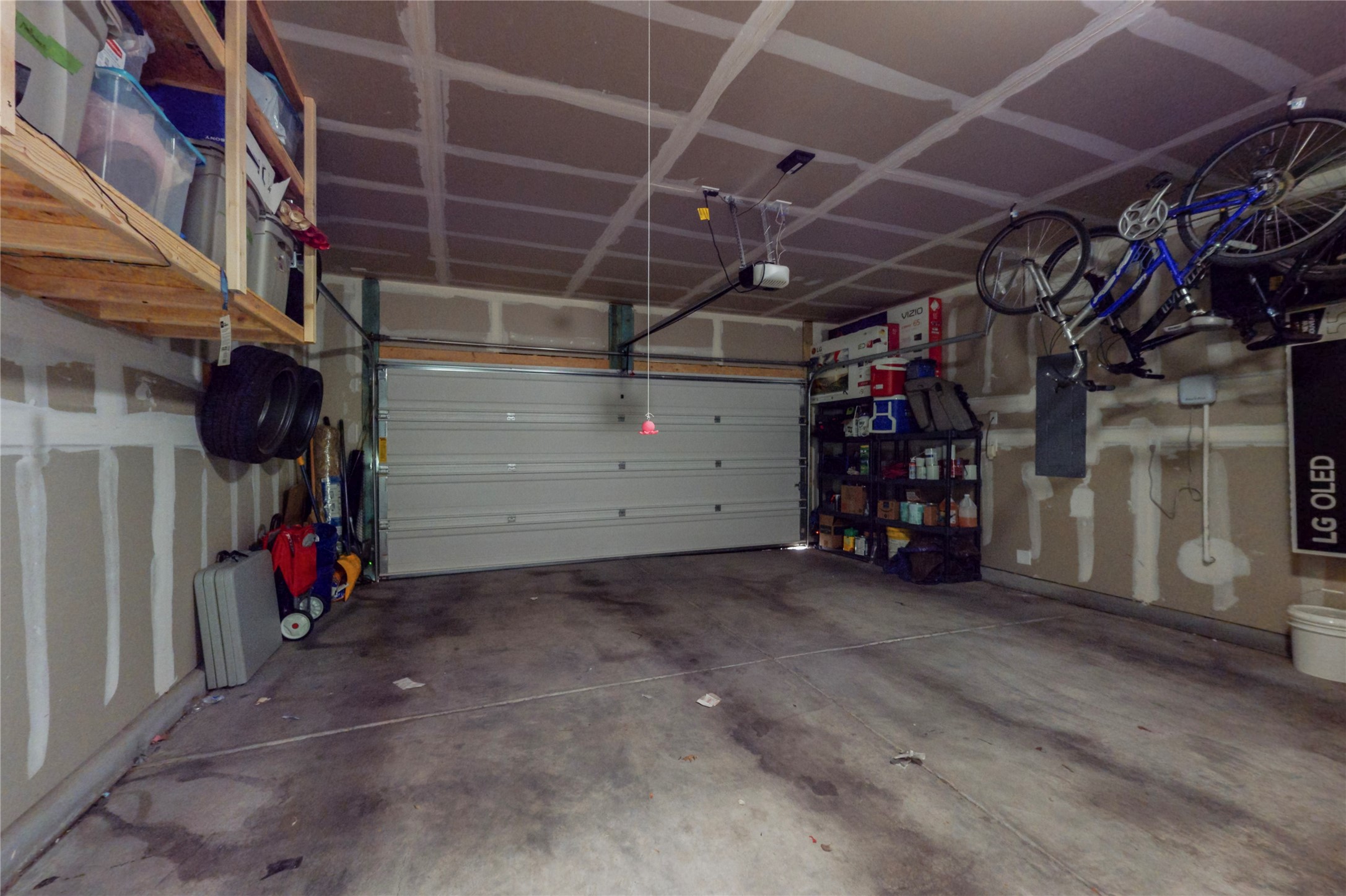 2 car Garage w/extra shelving for storage