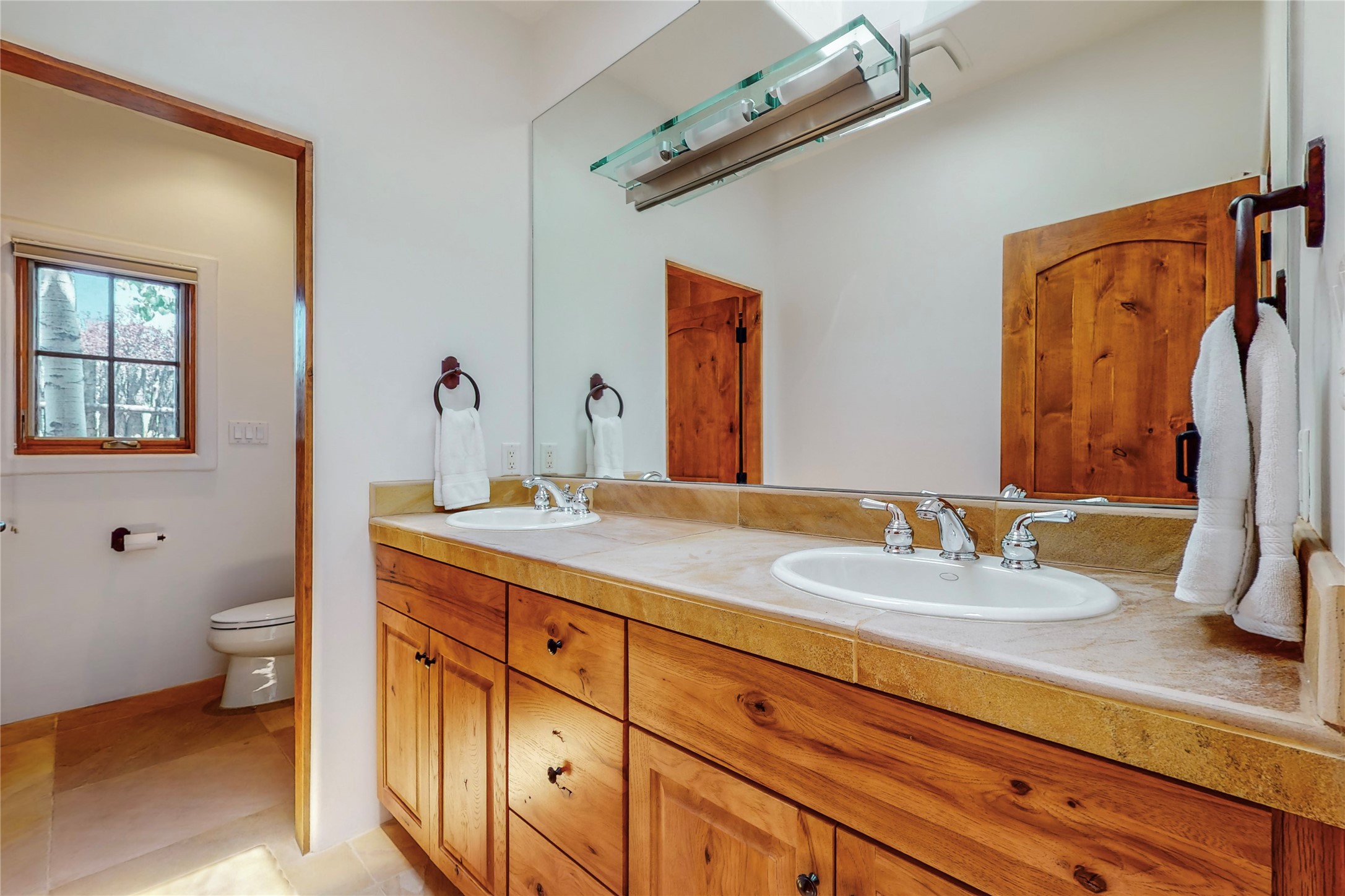 Full bath serves the two guest bedrooms