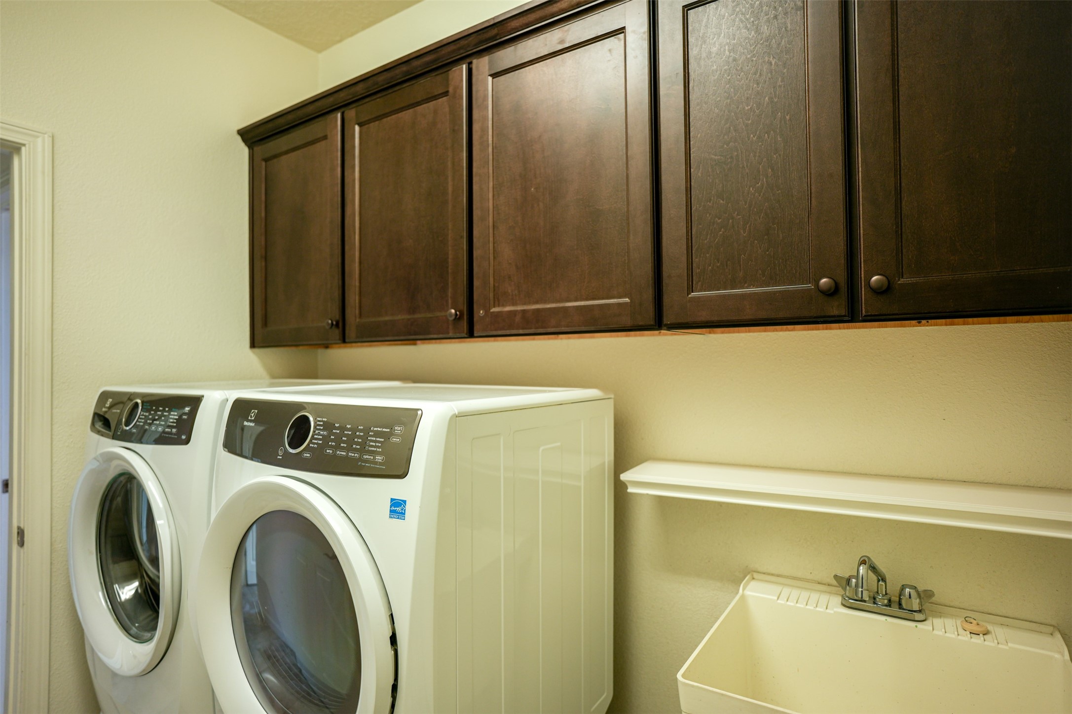 LAUNDRY ROOM WITH UPPER BUILT-IN CABINETS
