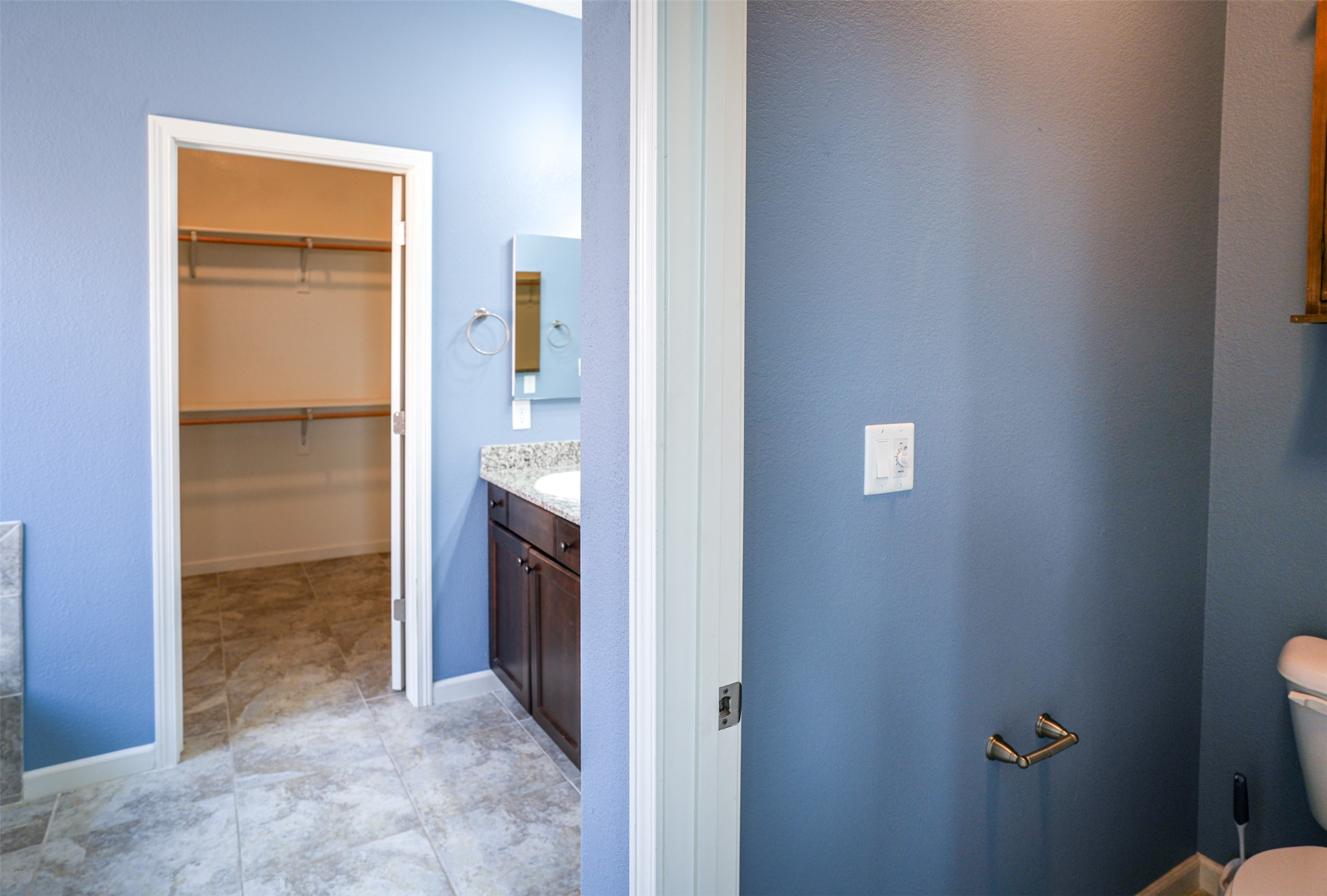 PRIMARY BATHROOM WITH WALK-IN CLOSET