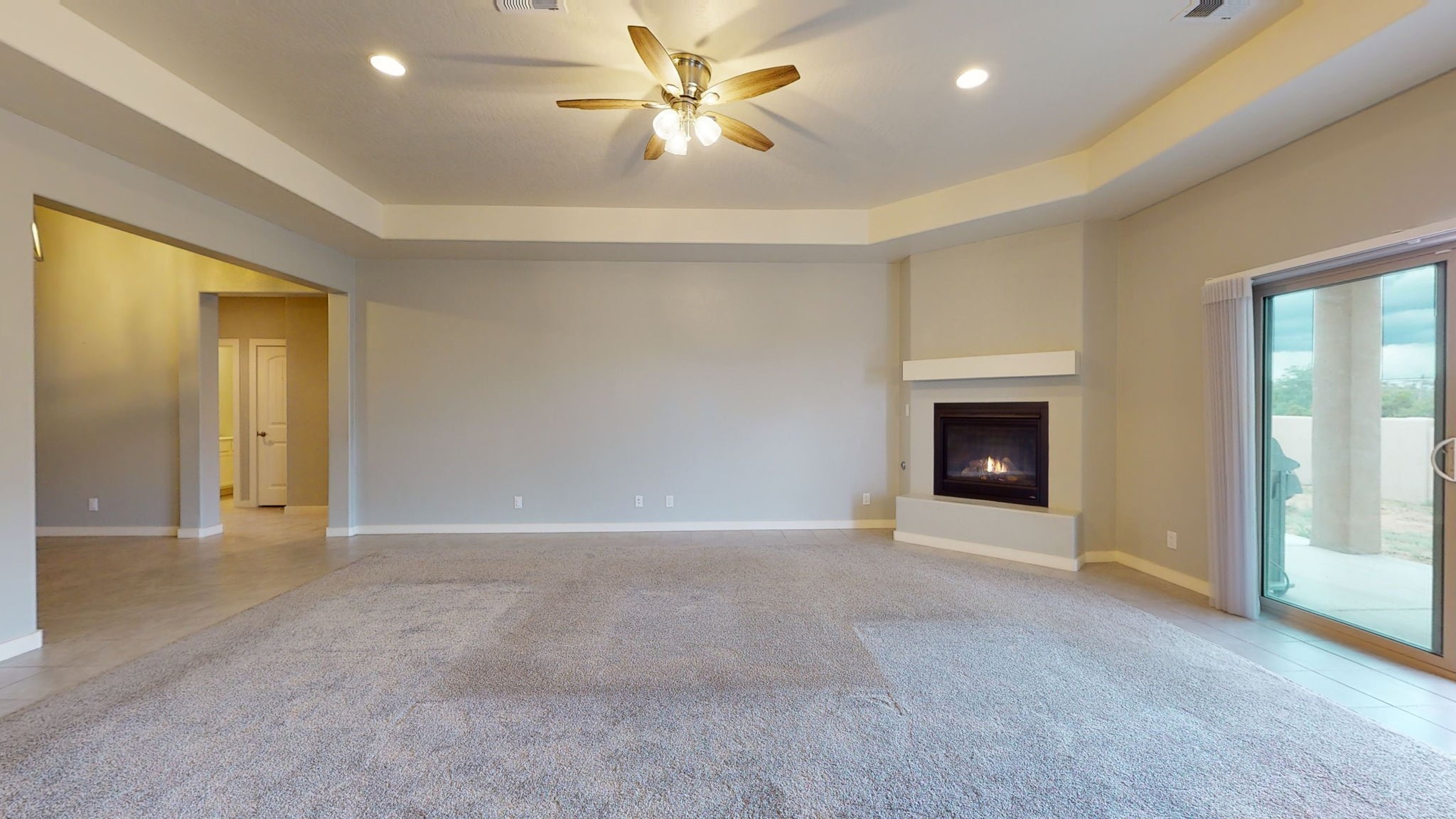 Living area with corner gas fireplace