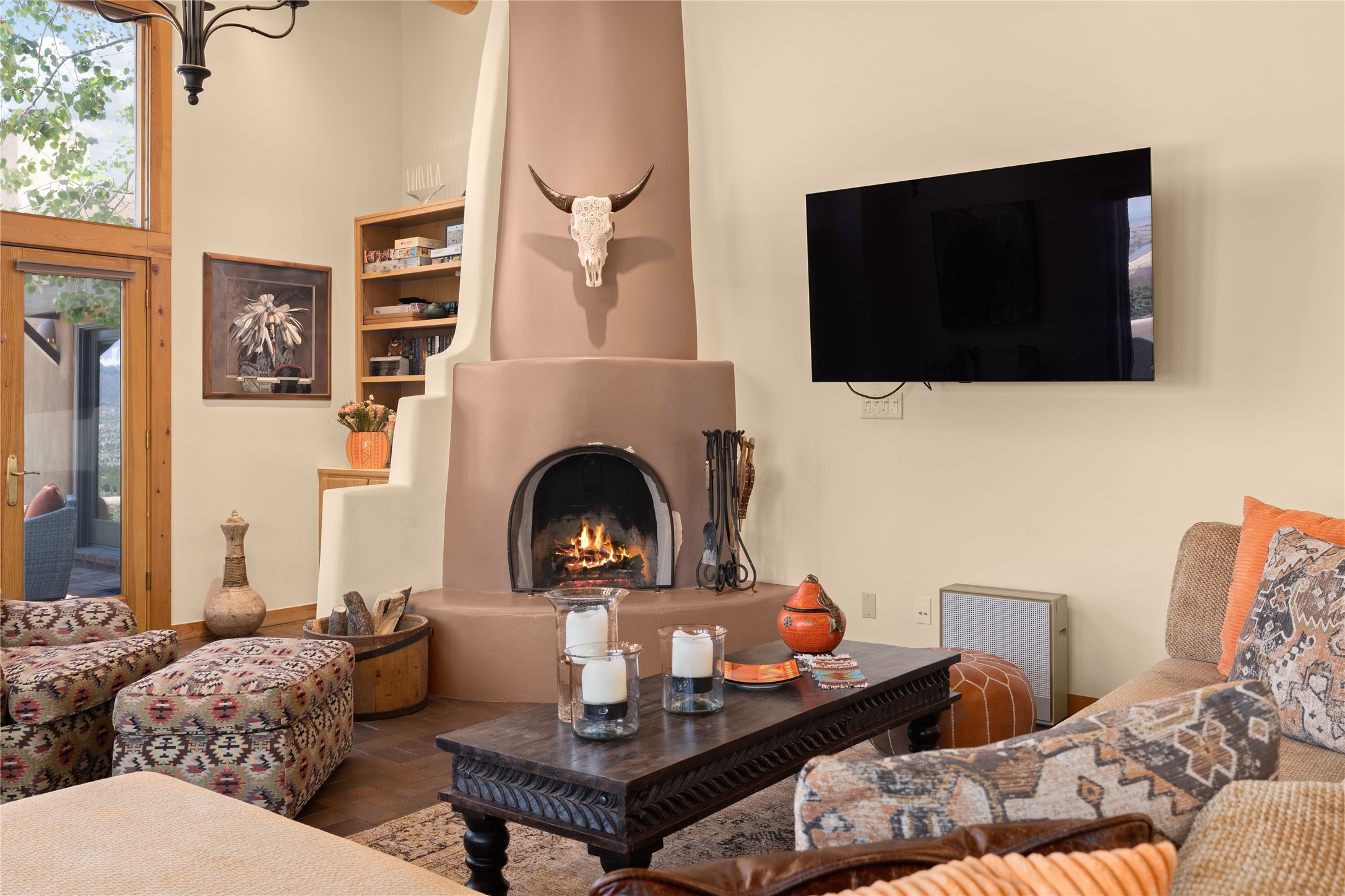 Cozy up next to the kiva fireplace with good company.