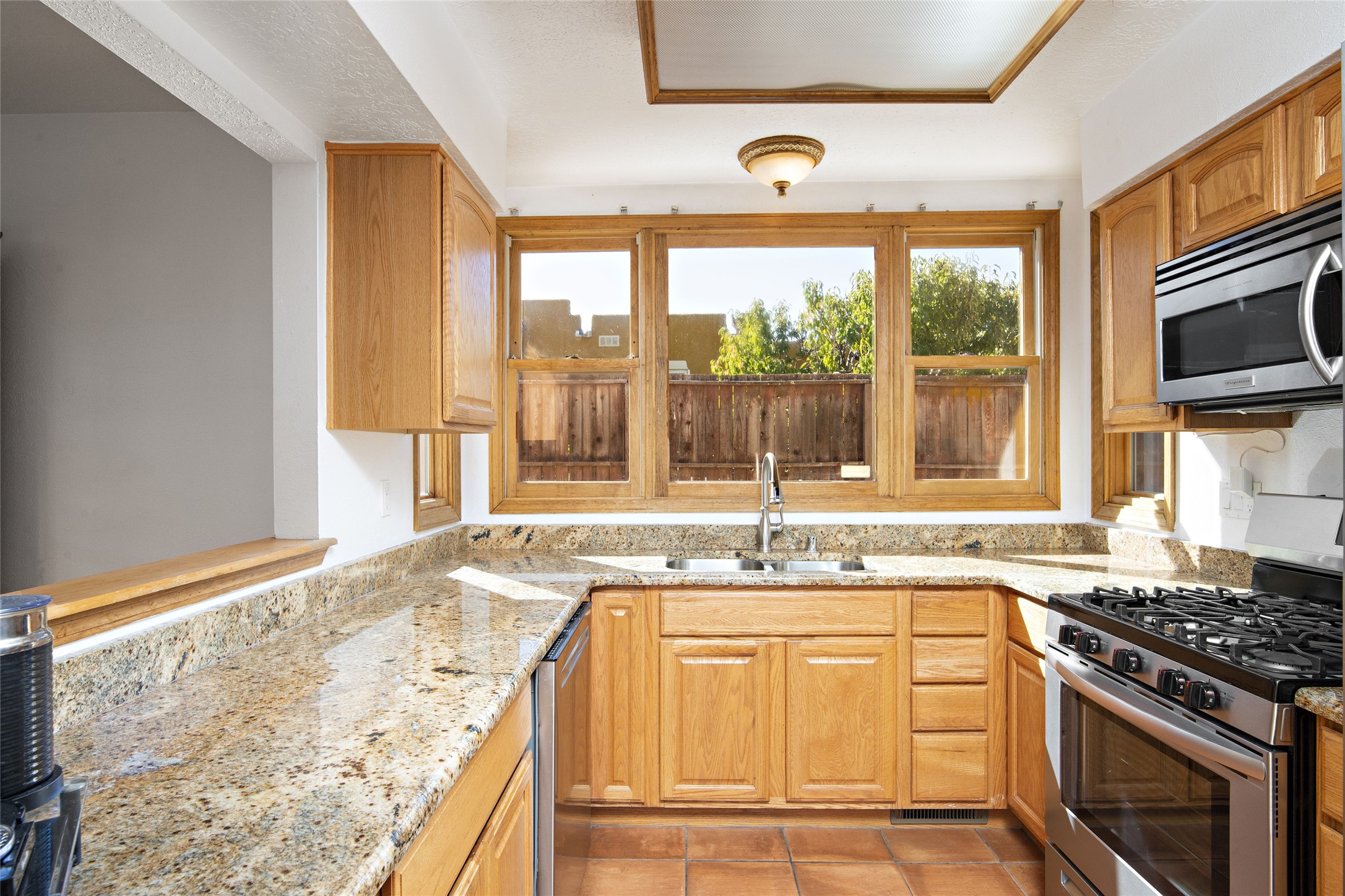 Kitchen with granite counters and Stainless Steel appliances