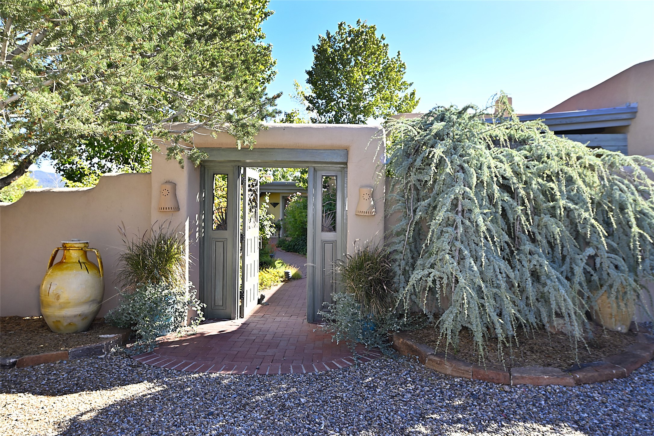 On a cul-de-sac in a secluded, quiet community just north of downtown Santa Fe and the Plaza