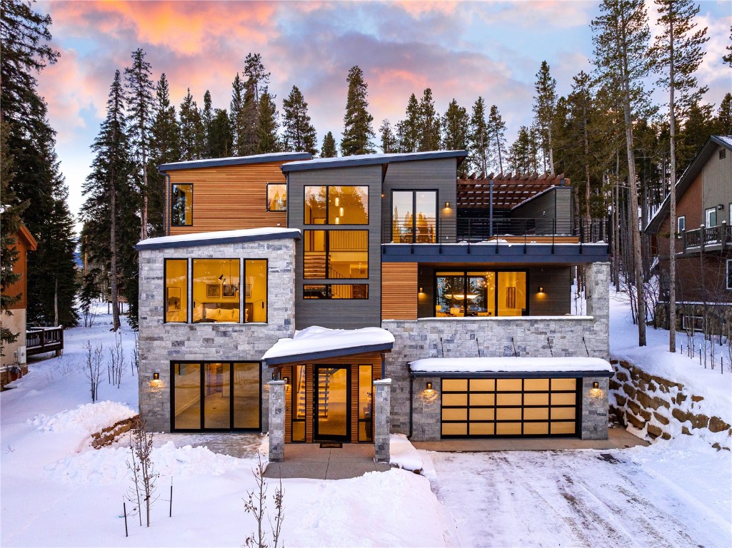 $1,000,000 price reduction! This is your chance to own one of the last of its kind; a ski-in, new-construction home sitting at the base of Peak 8 in Breckenridge. Host large gatherings with six bedrooms, three outdoor living spaces, a great room, a bonus room, and a family room. Top-tier finishes, Lutron lighting, air conditioning, elevator to all three floors, oxygen enrichment system roughed in, and smart wired throughout the home. Enjoy features like the sauna, ski room, two laundry rooms, and four-car garage. Expansive Ten Mile Range views on the rooftop deck. Within walking distance to the ski resort and gondola, which provides quick access to Main Street. Total building square footage is 6,738. Construction is to be completed in late summer. Come back for weekly updated photos to keep up with the progress!