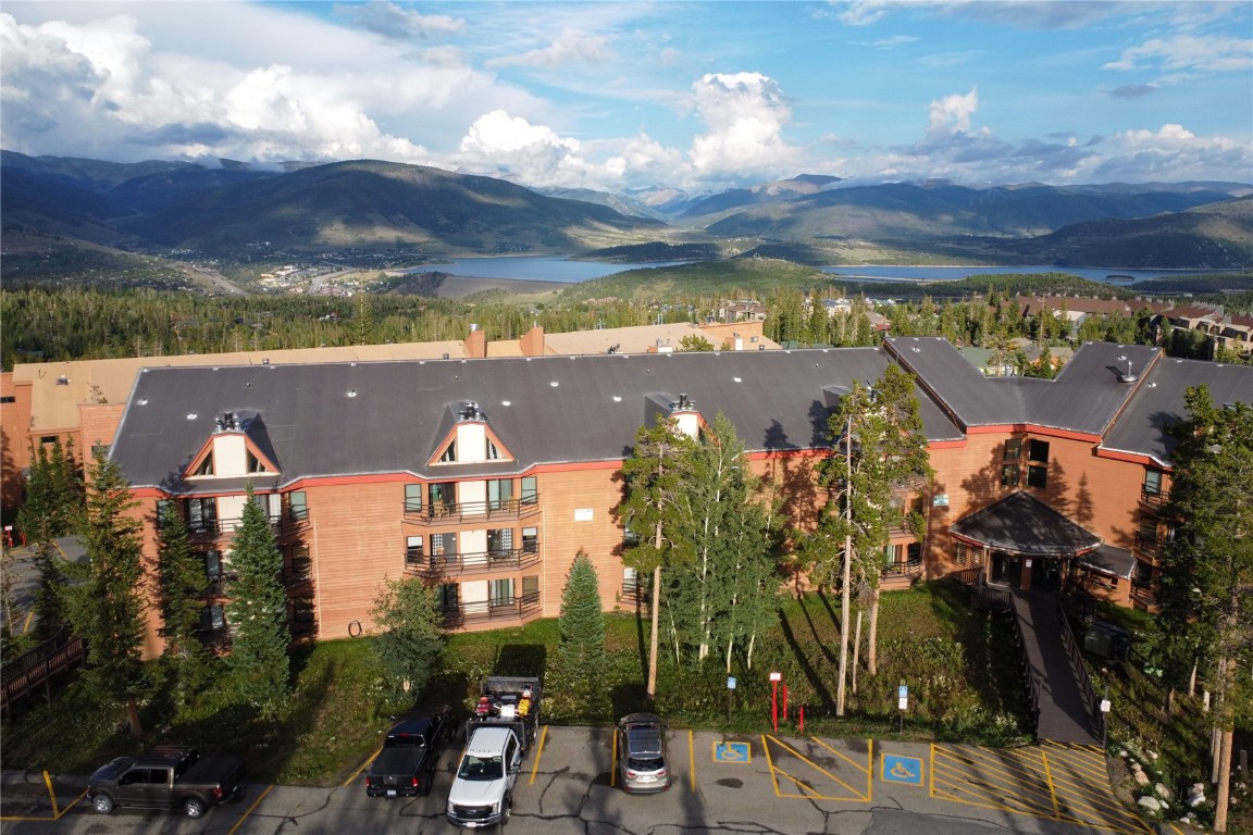This furnished condo offers a bright open living area, a wood-burning fireplace, bedrooms/bathrooms on opposite sides, a patio surrounded by big mountain views.  National forest is out the door to enjoy hiking, biking, snowshoeing, and more. The clubhouse is in the building, just an elevator ride away, including a pool, hot tub, sauna, and racquetball. There's plenty of surface parking, steps from the free bus stop and a short drive to the ski resorts, shopping & restaurants.
