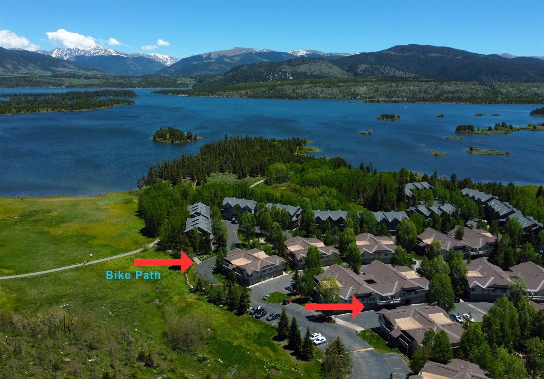 Arrive home after skiing one of the world class ski areas nearby or sailing on Lake Dillon, unload your toys in your garage, and walk right in (no stairs) to this 2 BED / 2 BATH condo, which is along the bike path and Lake Dillon. Cozy up to a fire in the open living-dining-kitchen area or enjoy the community hot tub.  New: furnace, hot water heater, kitchen sink and faucet, dishwasher, stove, storm door, over head lights, digital thermometer, and garage door opener. Washer and Dryer included.