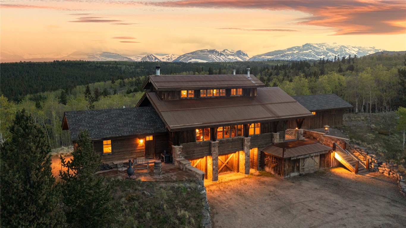 Experience peak-to-peak mountain views from every room at this private, 12.5 acre retreat in Silverheels Ranch.  Floor-to-ceiling windows reflect nature and wildlife in an idyllic gathering space, complimented by a chef's kitchen and stone fireplace.  Custom built by Sweet Homes of Colorado, this energy efficient home includes wood boiler, Triangle Tube furnace, grid-tied solar and fiber optic internet.  The equestrian community offers forest trails and fishing within moments of Breckenridge.