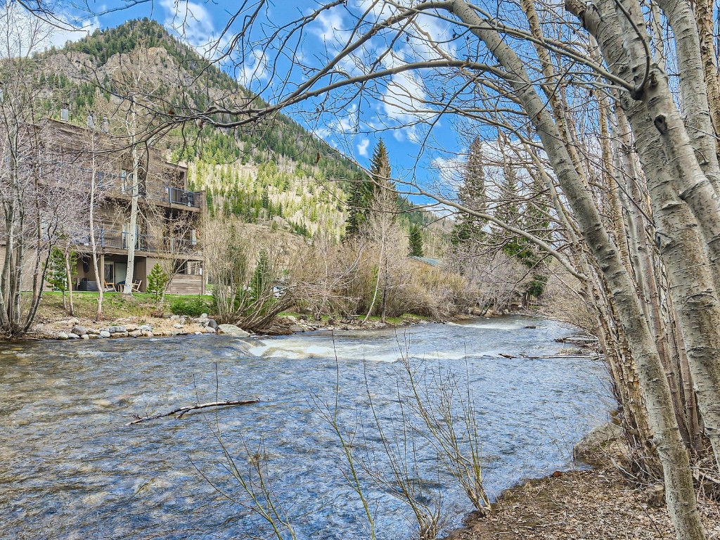 RIVERFRONT!  Beautifully re-modeled w/ an attached 1 car garage & an exceptional location in downtown Frisco! Overlooking the Tenmile Crk, you simply cannot find a better spot to unwind after a day of hiking, biking, or skiing.  Within 20 steps(!) of your front door is the free shuttle to Copper Mtn, or walk 4 blocks to the core of Frisco...the bike path & hiking trailheads are just a couple of blocks away! Nice floorplan w/ beautiful master suite + 2nd living area/loft that easily sleeps 2 more