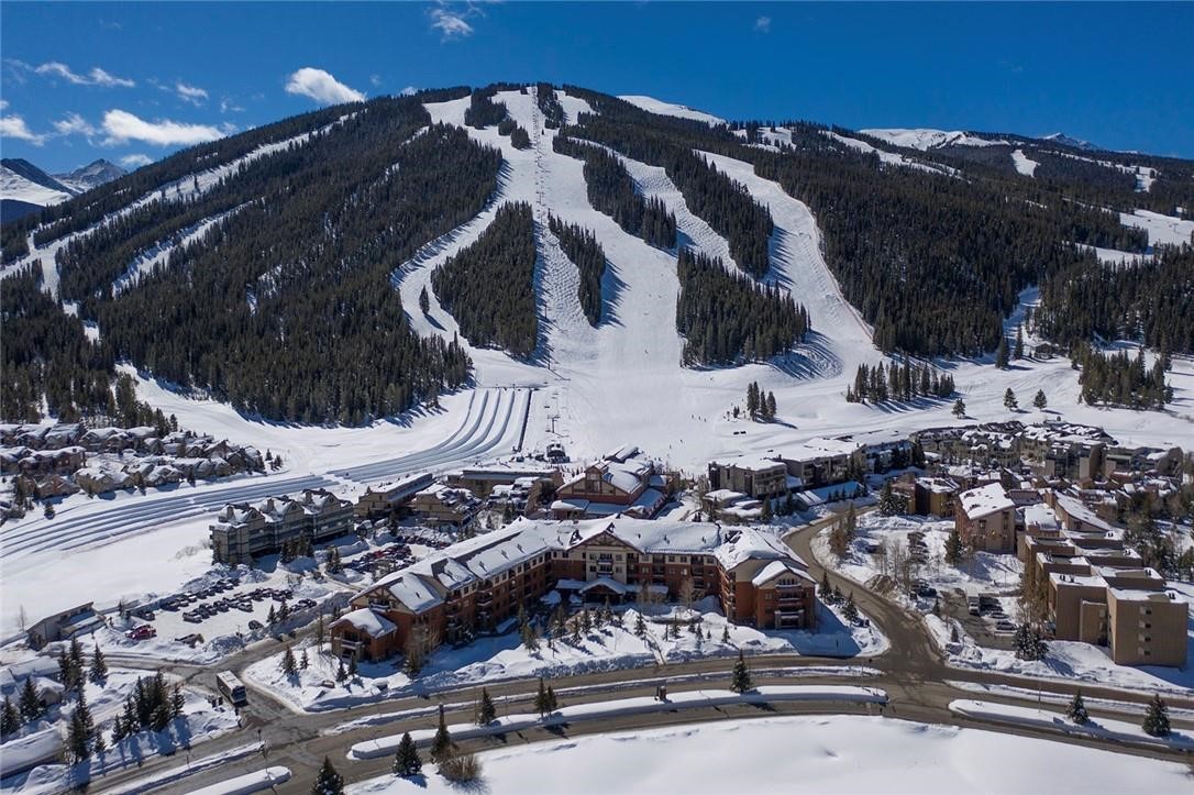 One of Copper Mountain Resort's larger 2/2 condos with 1,044 square feet! Easy sleeping for 6+ !!  Dramatic 2 story high living room ceiling, gas fireplace, open balcony, fully equipped eat in kitchen, huge primary bedroom + large loft and 2 full bathrooms!  Offered furnished!  Bldg amenities include heated garage with assigned parking by unit number, #305 Owner Storage Closet (4wX4dX10h) in basement, #305 Ski Locker, outdoor hot tub, common area picnic / BBQ deck, sauna & elevator!  Terrific East Village location - you can walk across the street to Copper's fastest 6 pack ski lift the Super Bee, the 1st tee (& 18th putting green) of the Copper Creek Golf Course, restaurants, coffee shop, ticket windows & all free shuttle stops!  NO Real Estate Transfer Fee at this location!