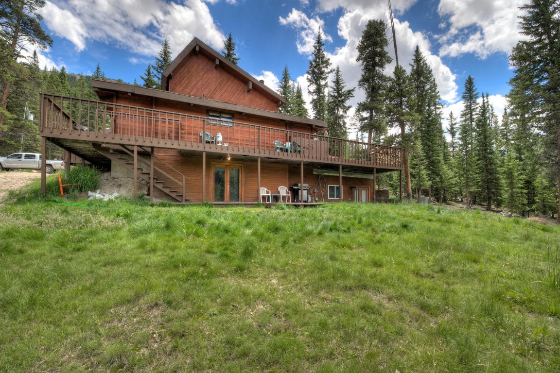 Very well maintained mountain home!  Six miles from downtown Breckenridge.  Three bedrooms with a spacious (over 1,000 sf) lower level living space with private entrance.  Large wrap-around deck on main level offers stunning mountain views.  Plenty of recent upgrades including windows, interior doors, and electrical panel.