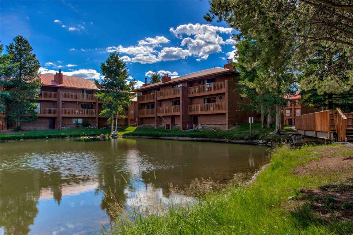 This 1,100 square foot condo is among the largest units available in Frisco, and it boasts a unique feature – it's situated beside a private lagoon! Located just a short walk to grocery stores, Starbucks, and Frisco Main Street. It's also positioned right along the Lake Dillon bike path and is easily accessible by bus, making it a great choice for exploring Summit County. The attached garage provides extra space for recreational equipment, such as skis, bikes, or even a man cave. Unlike traditional condos, Lagoon Townhomes are designed more like duplexes, with only one shared wall, offering a bit more privacy. Some standout features of this unit include two decks, new washer/dryer & kitchen appliances, spacious walk-in closet, cozy wood-burning fireplace, and a large open kitchen with ample counter space – perfect for hosting holiday dinners. Additionally, residents of this condo community can enjoy a clubhouse equipped with amenities like a heated indoor pool, hot tubs, a fitness center, tennis/pickleball courts, and even a private stocked fishing pond. The central location provides easy access to five major ski resorts and I-70. This condo has been well maintained, super clean, and ready for showings. Don't miss the opportunity to make it your own!