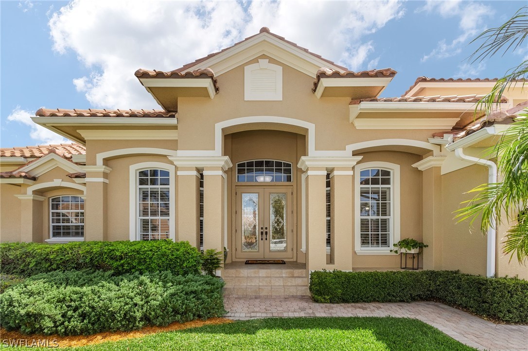 Front of 350 Cottage Court, Marco Island, Gulf Access Homes only 1/2 mile from FAMOUS Tiger Tail Beach!