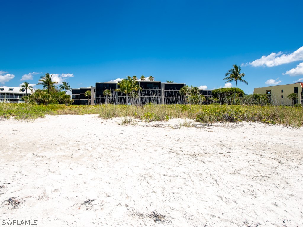 This is a RARE find on Sanibel Island! Come see this spectacular 3 bedroom & a den plus 3 full bath gulf front third-floor unit located just off Sanibel’s West Gulf Drive. One of only six 3 bedroom units of the 24 unit complex with almost 2,000 square feet under air and a 220 sq. ft wrap-around screened/glass lanai overlooking the pool and the beautiful Gulf of Mexico. Upgrades include tile and vinyl flooring throughout, granite countertops, and impact sliders. There is an elevator and covered parking with a storage unit for extra equipment. A new roof was installed in 2020 and new plumbing is scheduled for August 2022. This unit earned $94,000 of rental income in 2021. The Atrium condominiums are well known for their lush landscaping and beautiful amenities including tennis court, heated pool, outdoor grills, and a boardwalk beach access. Don't miss this opportunity to own a third-floor large 3 bedroom/ 3 bath condo on Sanibel Island!