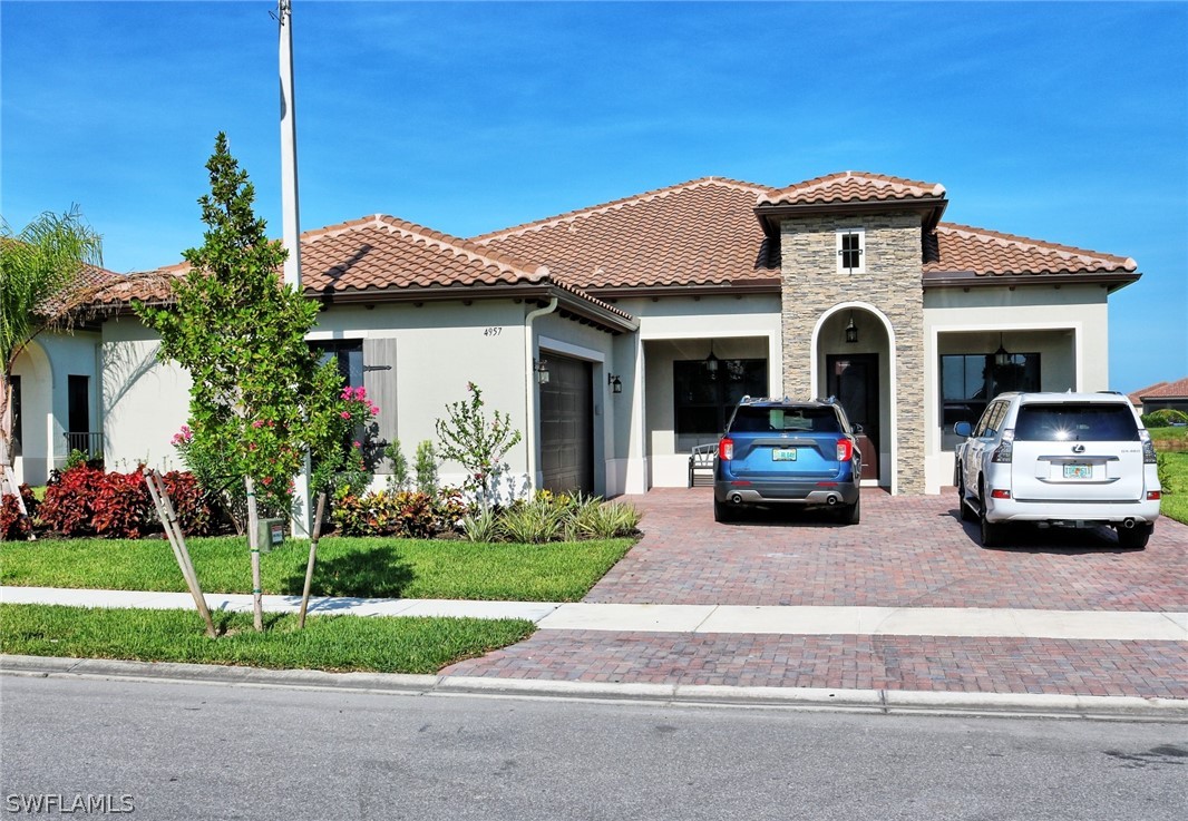 Beautiful 4 bed 3 bath model Briones house with lots of upgrades. 2900 SQF under air.  Gourmet Kitchen with SS appliances. Great community amenities included in HOA. Tile throughout, impact windows and doors, plenty of room for a pool, 12ft high ceilings.  Schedule you private showing today!
