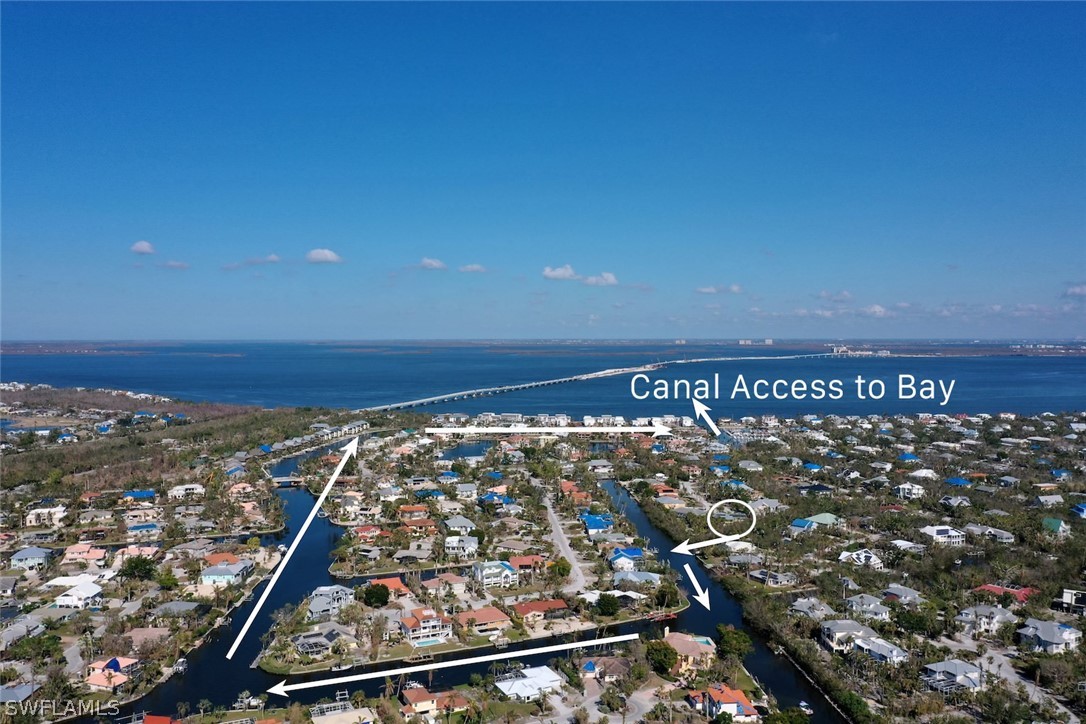 Spanning nearly half an acre of land, this canal front property sits at the end of a quiet cul-de-sac on the east end of Sanibel Island. With only one bridge to cross under, boaters can be in the Gulf waters in no time. This spacious ground-level pool home has been gutted following Hurricane Ian and is ready for your renovation. Enjoy a large yard, canal with dock, metal roof with solar panels still intact, and easy access to the Causeway. This property was appraised at $2M following Hurricane Ian.