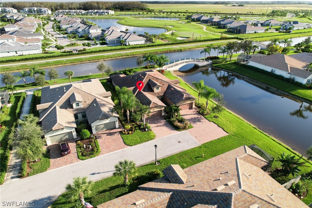 2018 Serenity CANAL FRONT Villa in Bellera at Del Webb in the Ave Maria community. 1542 square feet on a quiet cul-de-sac in a gated 55+ community. 2 bed 2 bath + den/office. Extra large extended lanai with a spa included. The Interior is highly upgraded and in brand new immaculate condition but no photos were taken due to moving boxes everywhere. Del Webb is a 55+ Active Adult Community with (2) Club Houses & OPTIONAL Golf Membership. Amenities: (12) pickleball courts, (6) bocce courts, (2) tennis courts, salt water pool, 3-lane lap pool & much more. Ave Maria is an amazing town with tons of charm!