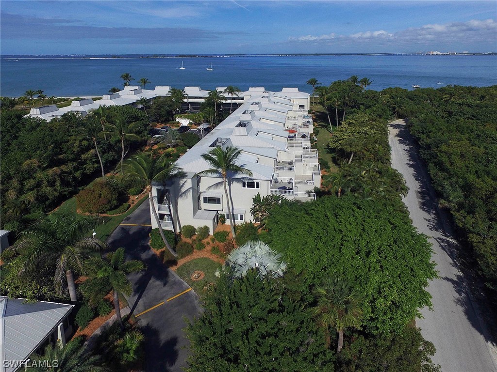 Wonderful opportunity to own a top floor 2BR/2BA plus den condominium located on Sanibel’s east end with direct views of the historic lighthouse. Relax on one of the two patios, each with bay and lighthouse views. Light and bright living space with updates throughout including stainless steel appliances and side by side washer and dryer. Stroll to the beach or fishing pier and enjoy island living at its best. Lighthouse Point is a meticulously maintained community that is in the process of restoration. Owners enjoy a heated swimming pool, tennis, clubhouse and onsite office. The unit has suffered some minor hurricane damage and has been remediated and is being repaired. Amazing opportunity to enjoy both the San Carlos Bay and the Gulf of Mexico right out your front door. Being sold furnished this condo is a must see and will fulfill all your island dreams!