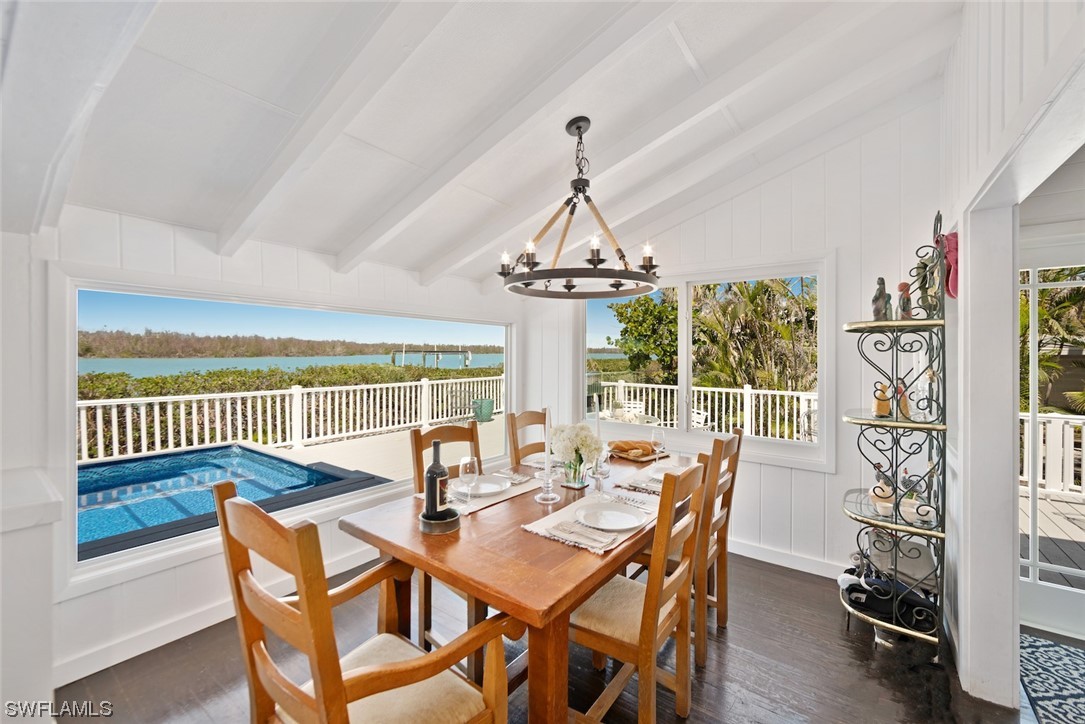 Take a step back in time on the bay at "Coconut Cottage". This meticulously refurbished Hemingway style home is quaint and reminiscent of OldeFlorida and days gone by. Set up as a four bedroom, there is room for the whole family with 2 living spaces along with a large deck in addition to a wrap around dock. Overlooking Sunset bay to the west, this location is home to a myriad of birds, dolphin and manatee alike. If you have been searching for a quintessential island cottage within walking distance to the beach you have arrived. Furnishings are negotiable. Roof is in the process of being replaced. Dock will be repaired.