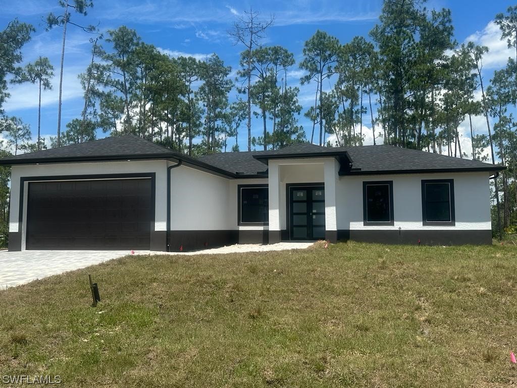 New construction home in East Lehigh Acres in 0,5 acre lot. This house features 3/2 plus Den ( could be used as bedroom ) and two car garage, high ceiling, titles 32X32 through all, stainless steel appliances. Is time to select this one before it's gone
