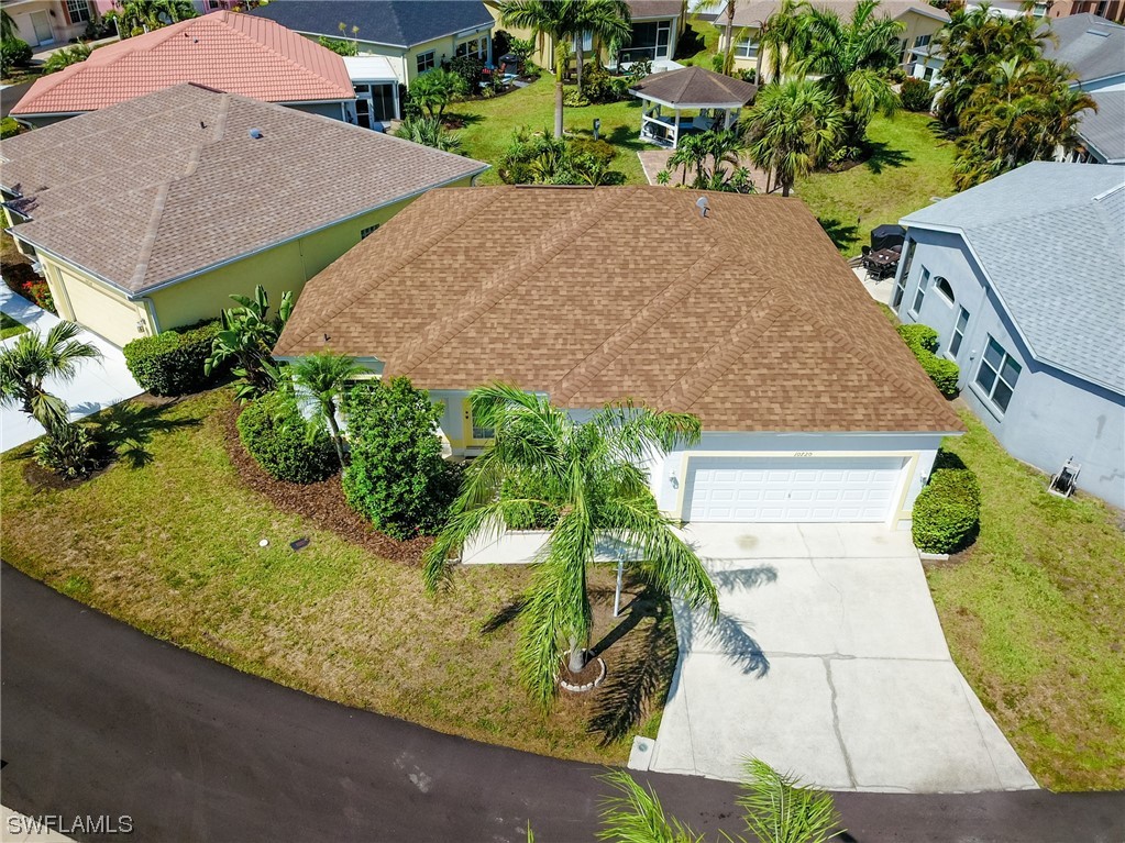 Lowest Priced Single Family home in Estero! This well maintained 2 bedroom 2 bathroom home is located in the gated community of The Island Club. New HVAC May 2023, Roof 2019. Natural light fills this open floor plan with split bedrooms. Tons of potential to put your own style on this bright and neutral home. Guest room in front has access to the guest bathroom through a small flex space with pocket doors. Perfect for a home office or mud room! Huge master bedroom with king size bed and large walk in closet. Dual sinks and updated walk in shower. Glass sliders from master and living room lead to screen lanai facing backyard. An additional 11 ft of yard can be purchased for $1,500 from the HOA at closing, which would allow room to add a patio or lanai. This is an all ages community of 250 homes with a 23-acre lake perfect for fishing or kayaking. Affordable HOA fees of only $700 per quarter, include Water, Sewer, Lawn Maintenance and cable! Lakefront clubhouse with community pool, spa and fitness room, Tennis, Pickleball, and Shuffleboard! Easy access to RSW airport, close to I75, FGCU, and shopping! New Estero Crossings, with restaurants right outside the gate. See virtual tour!