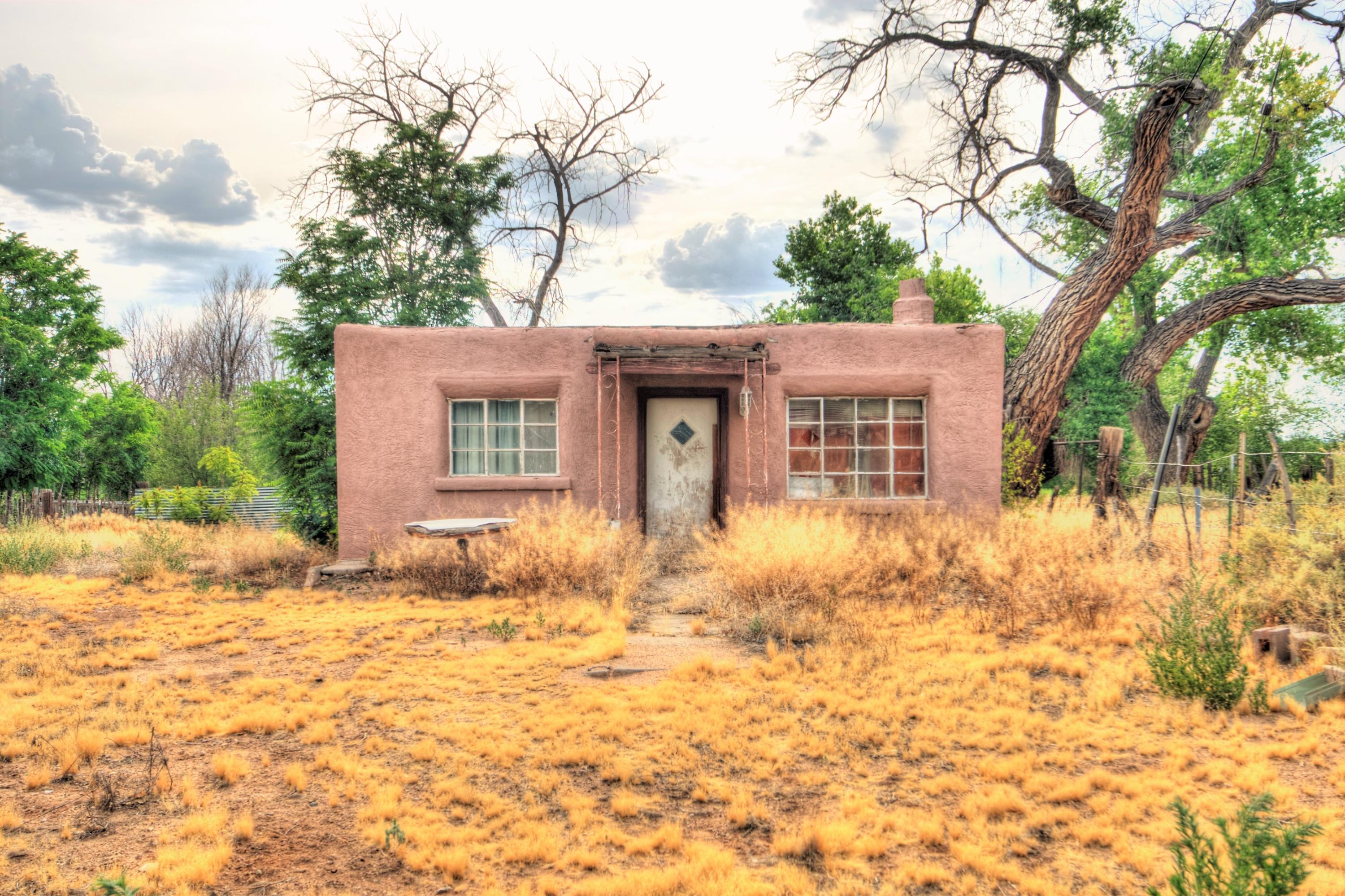 This North Valley Adobe Home is tucked away in a Great Location. Huge potential with a Awesome 0.37 Acre Lot! Sold As-Is, Cash Only with Proof of Funds!!!