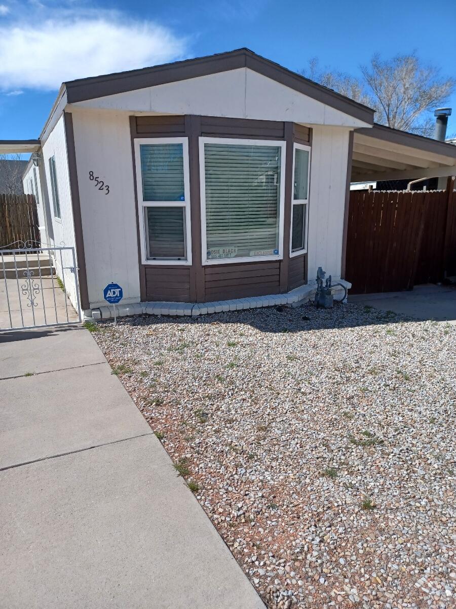 MOBILE HOME, LAND, CAR PORT, LARGE STORAGE... NEWLY PAINTED...TILE & VINYL  FLOORS...   HOME OPEN TO  SHOW  NOON  T0  6PM.  CALL LISTING AGENT TO SEE STORAGE...