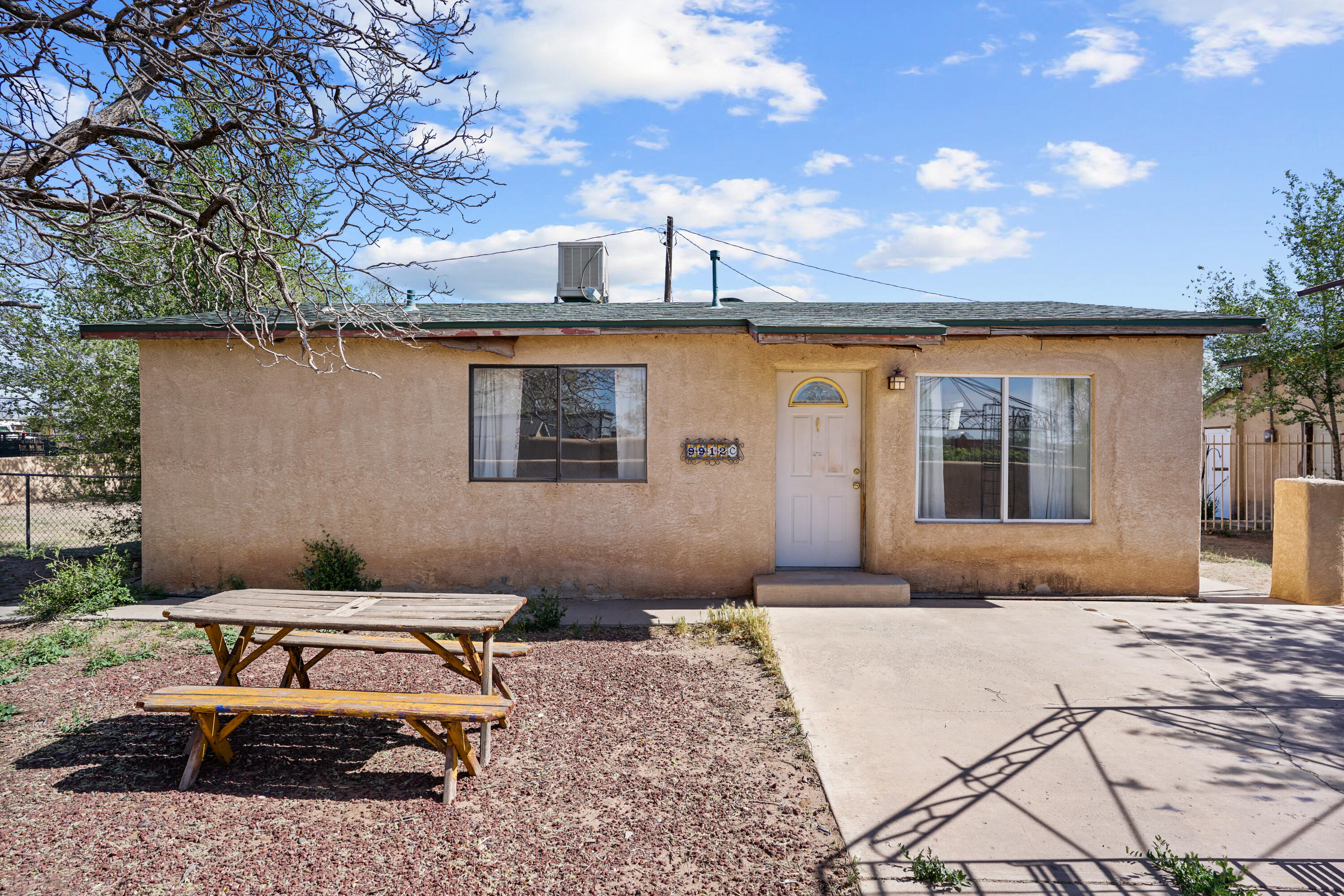 Welcome to this affordable home in a terrific North Valley location.  This home is situated on a large 1/3 acre lot, and features 2 bedrooms and 1 bathroom.  The home will need some updating, but the roof on the main house was replaced within the last few years.  You'll love the huge detached 2 car garage as well.  Perfect for storage or the hobbyist including high ceilings and large roll up doors.  Owner prefers to sell the home in as-is condition.